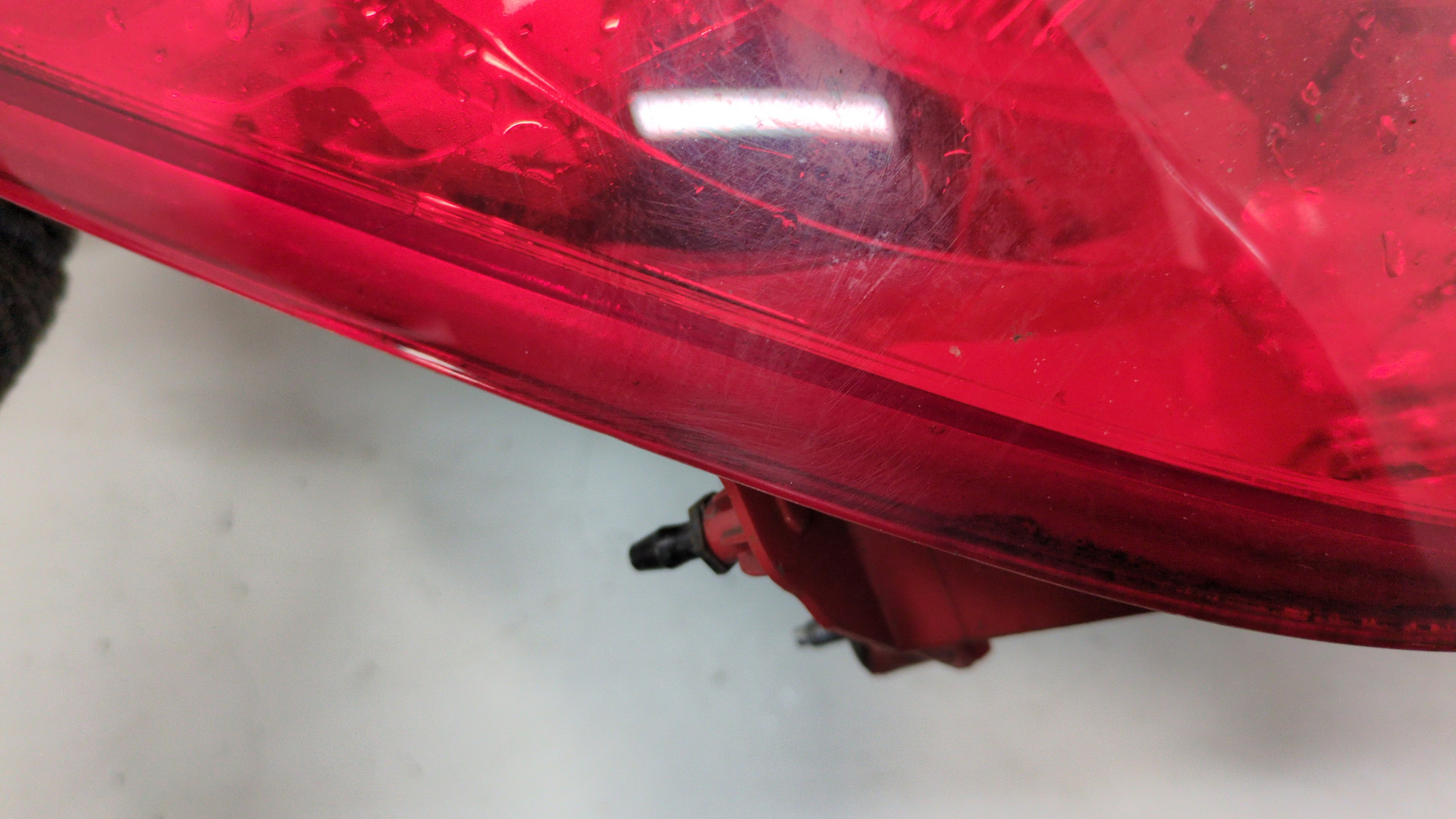 Фонарь задний левый