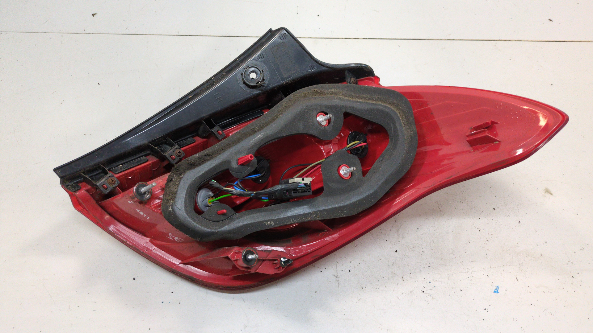 Фонарь задний левый