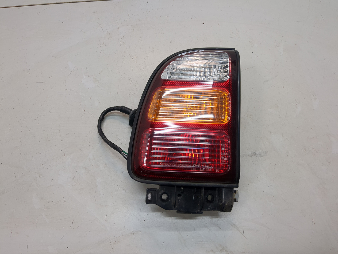 Фонарь задний левый