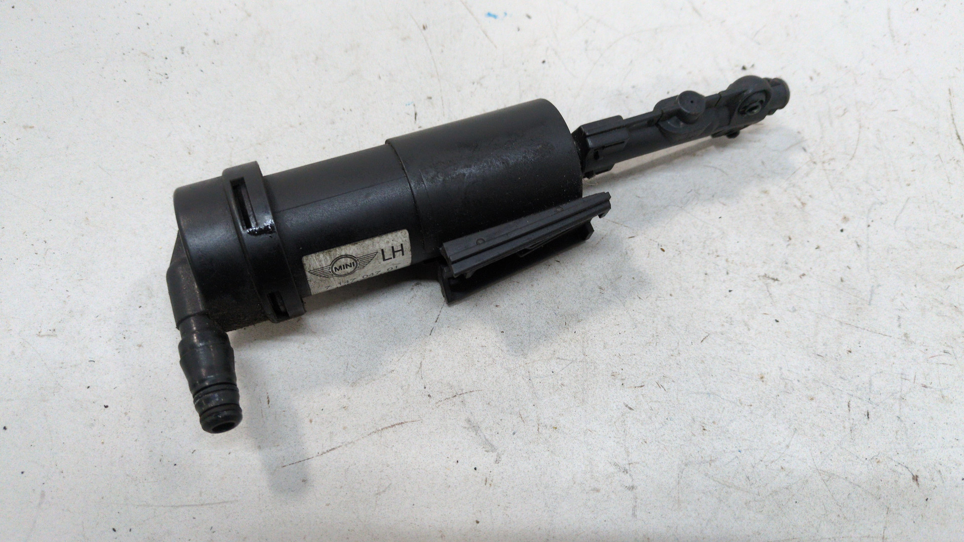 Форсунка омывателя фары