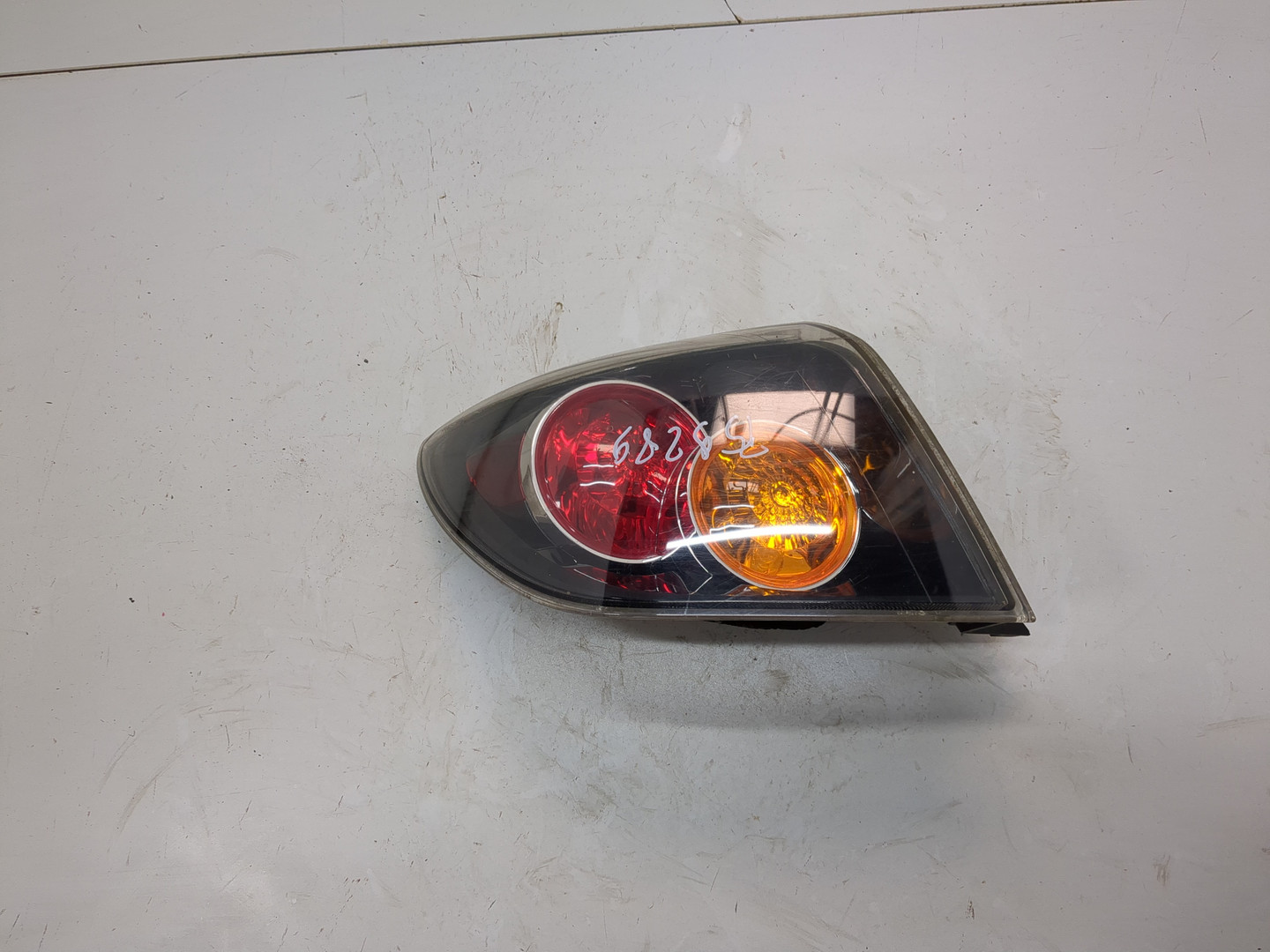 Фонарь задний левый