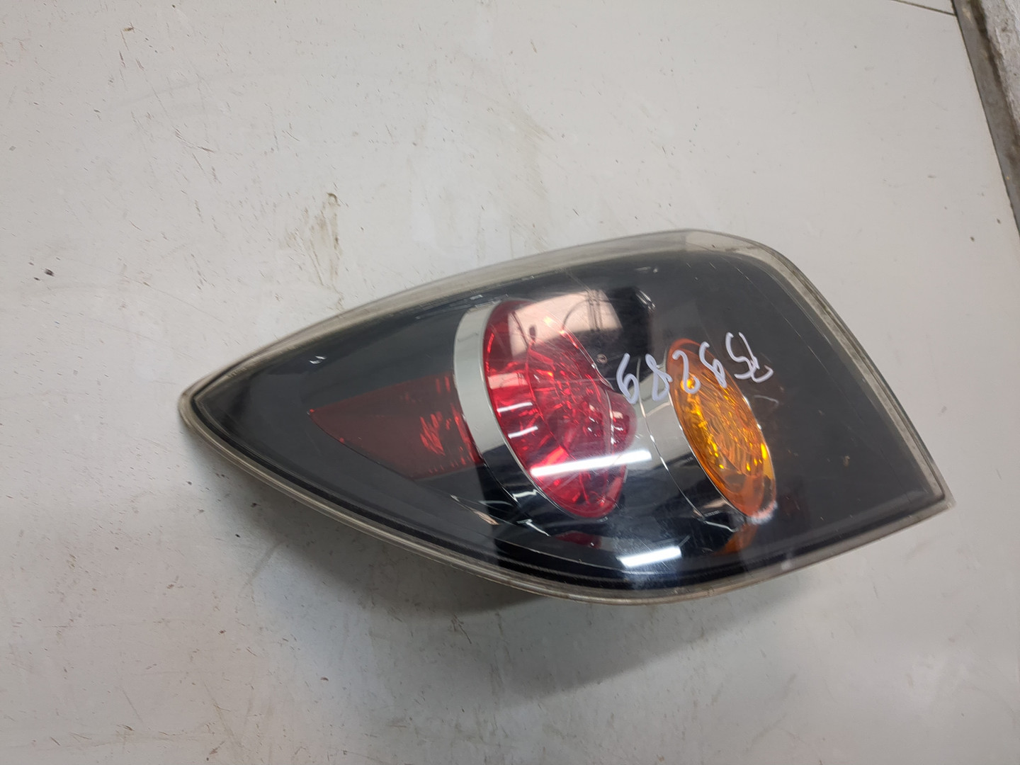 Фонарь задний левый