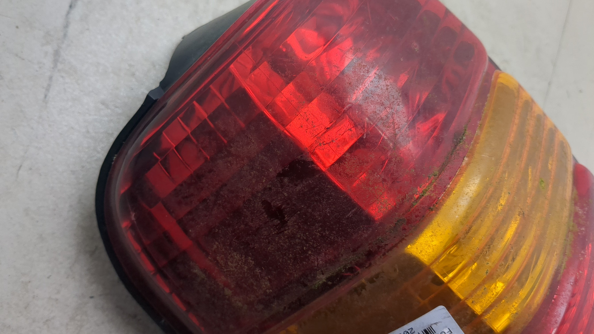 Фонарь задний левый