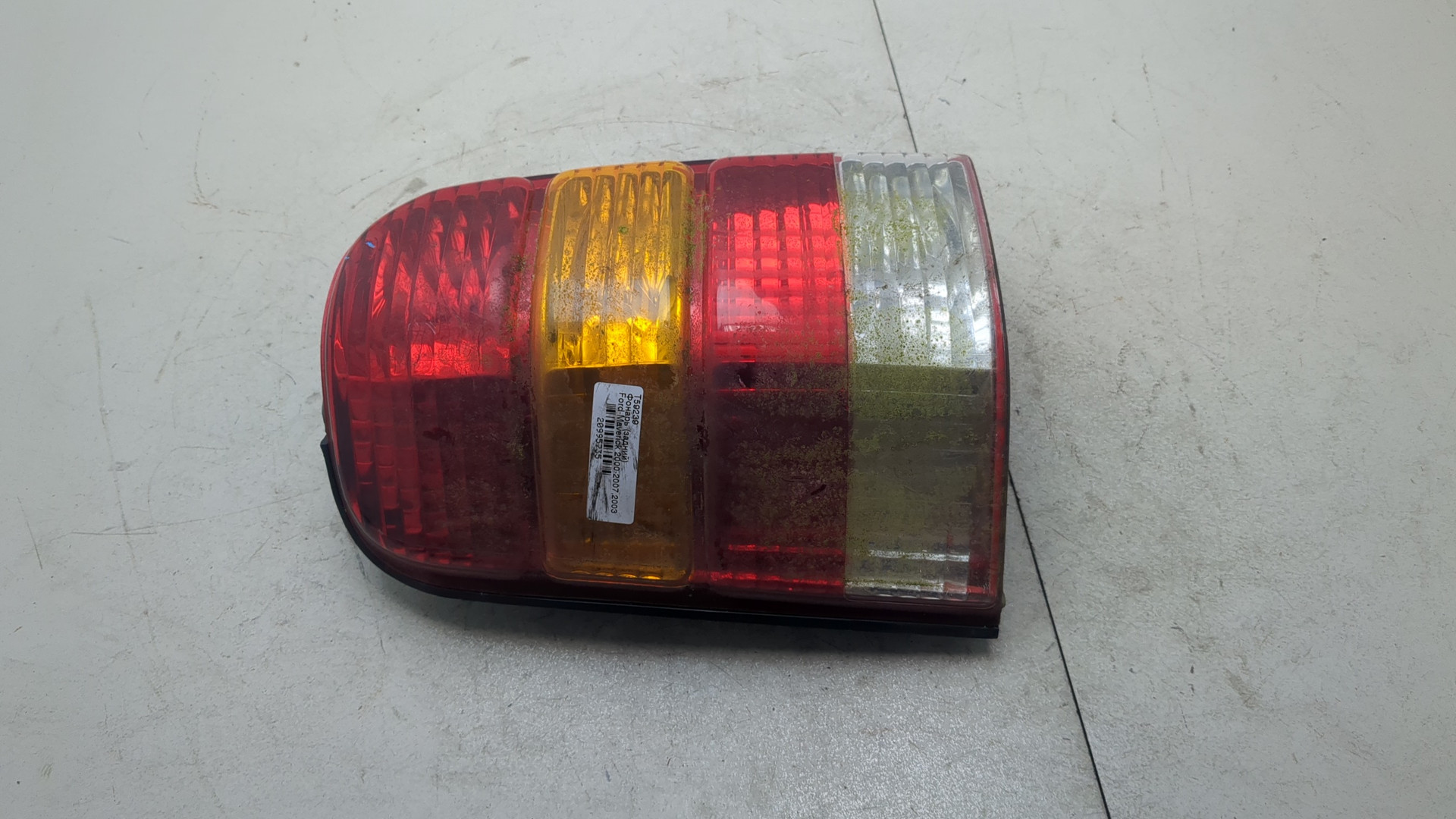Фонарь задний левый