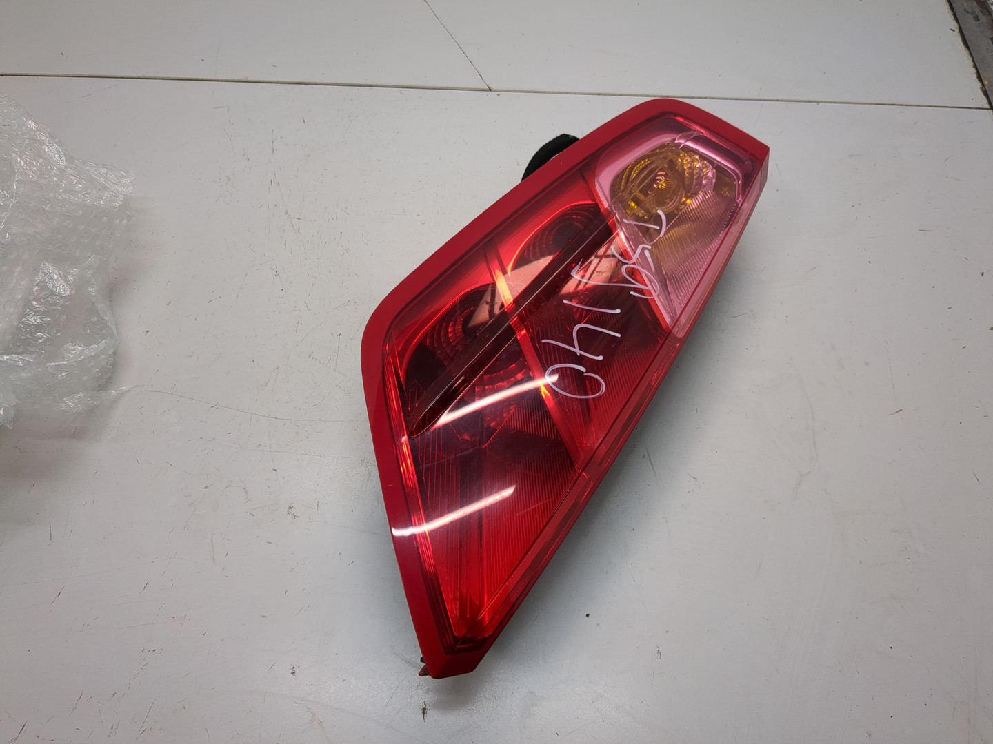 Фонарь задний левый