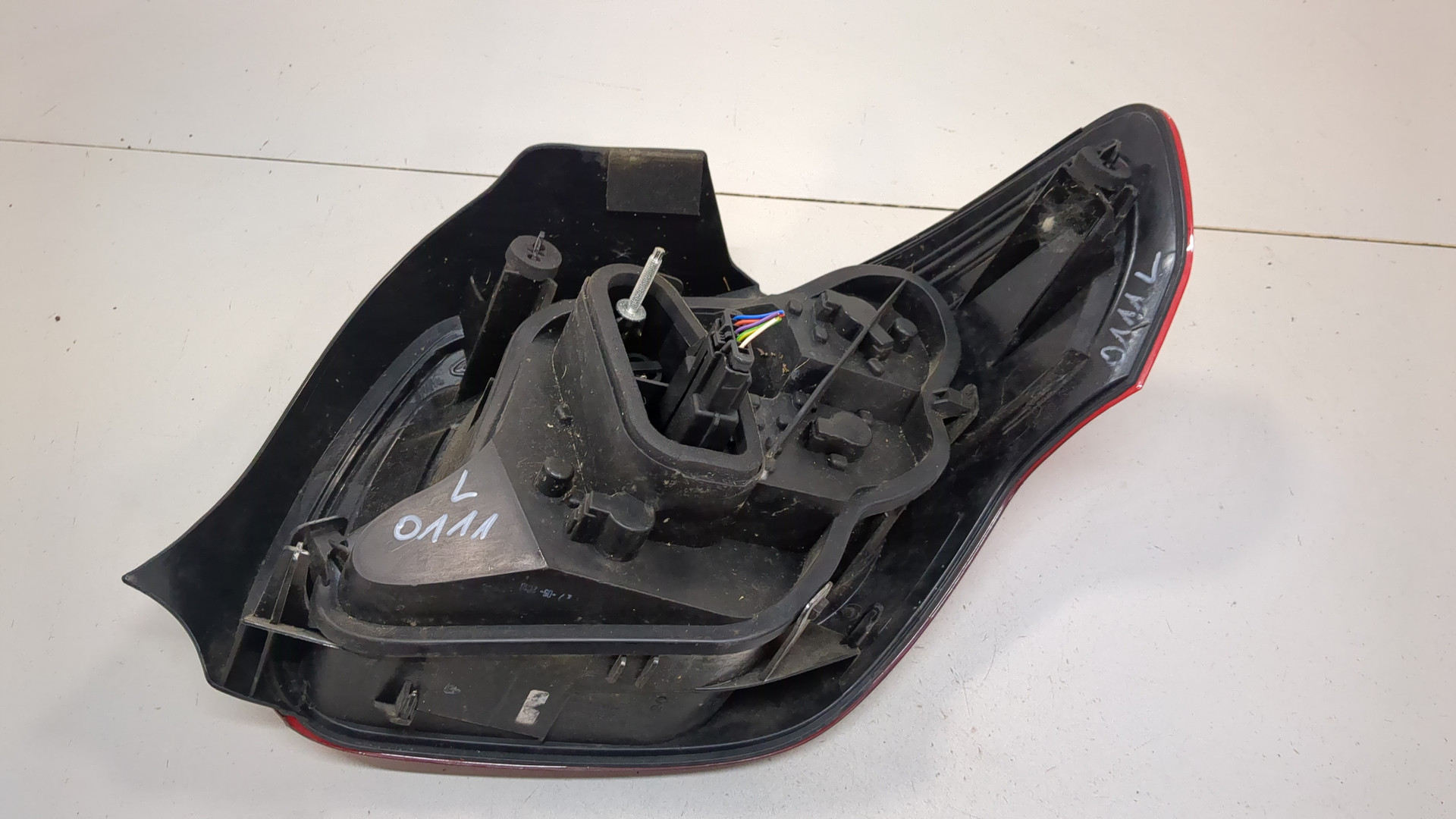 Фонарь задний левый