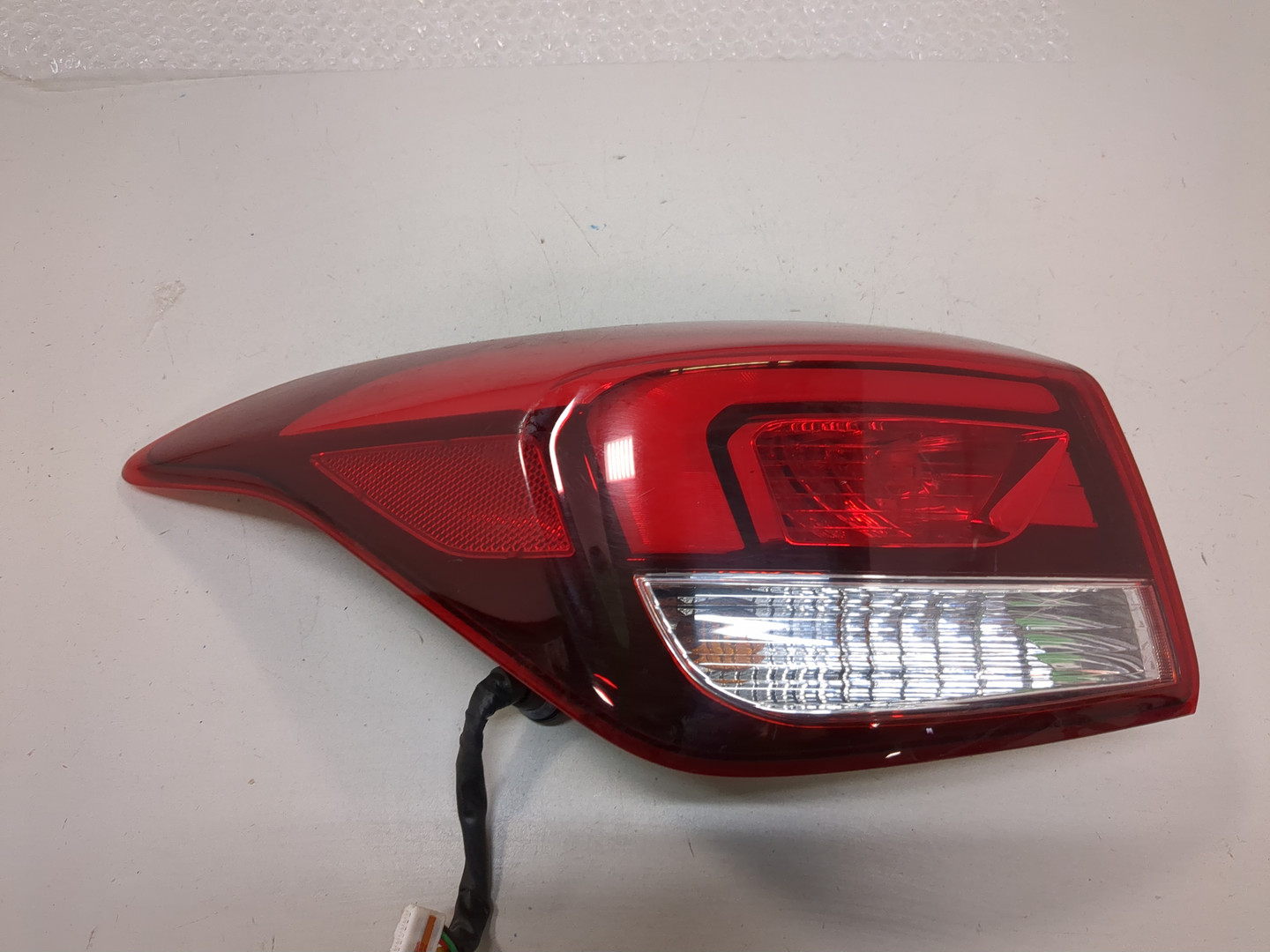 Фонарь задний левый