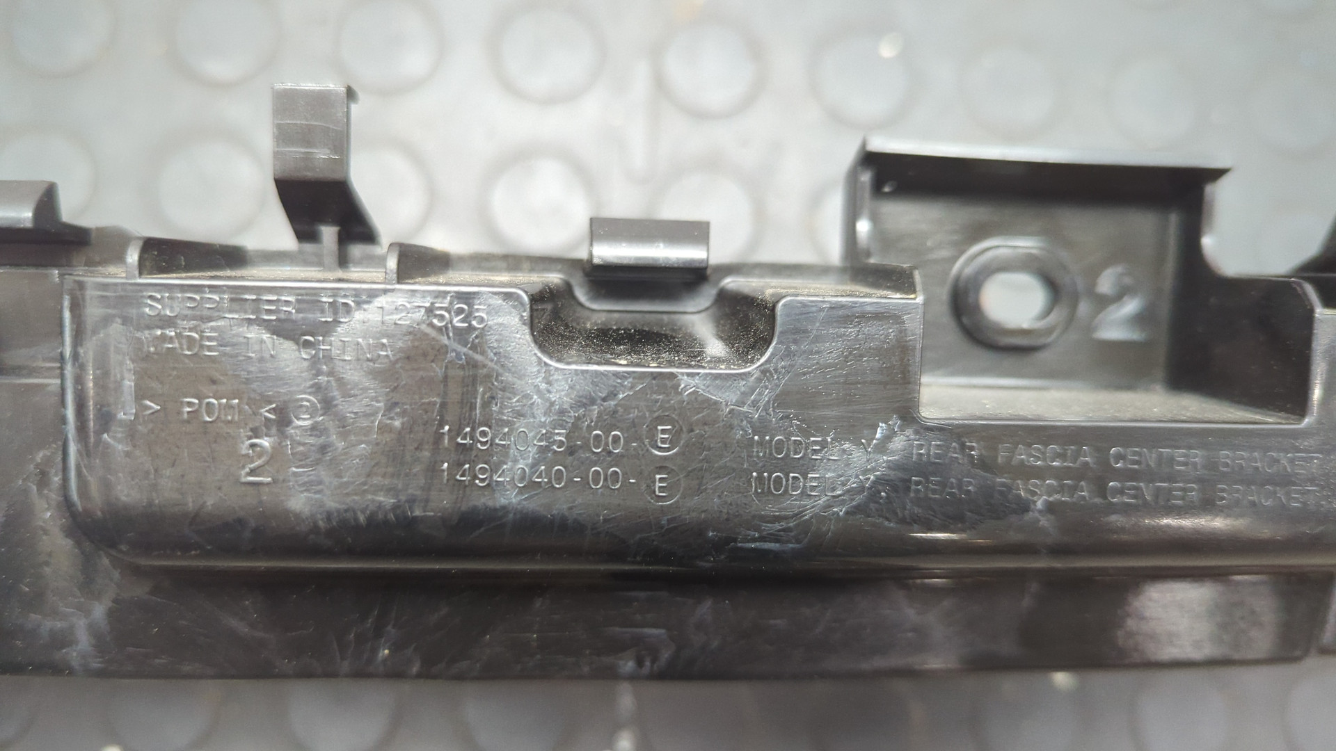 Кронштейн заднего бампера