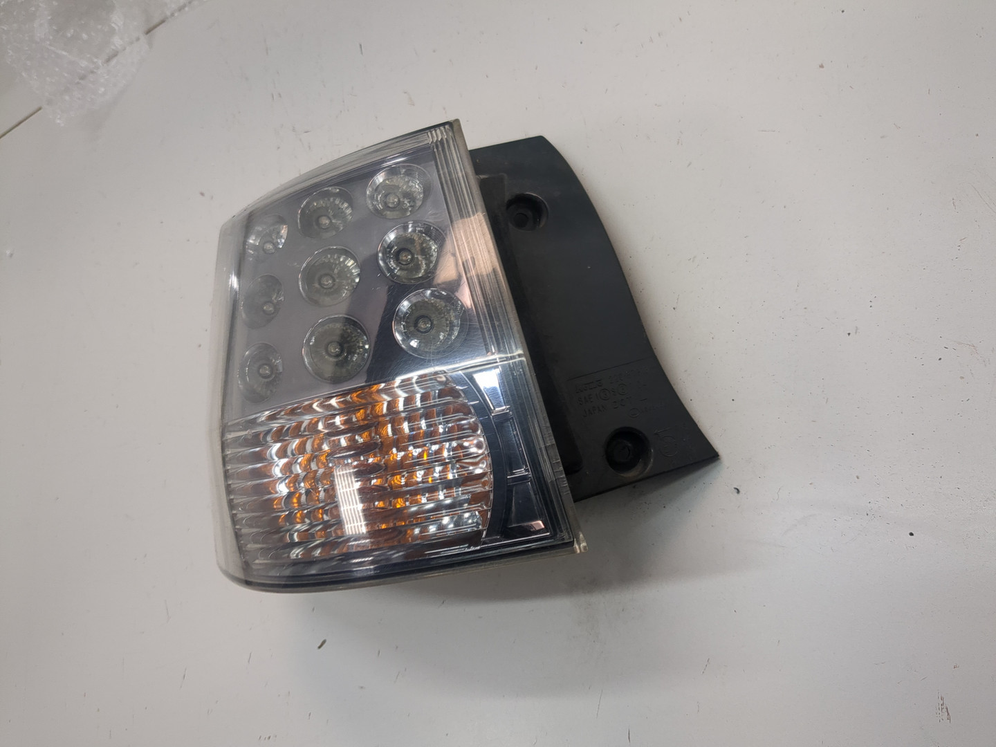 Фонарь задний левый