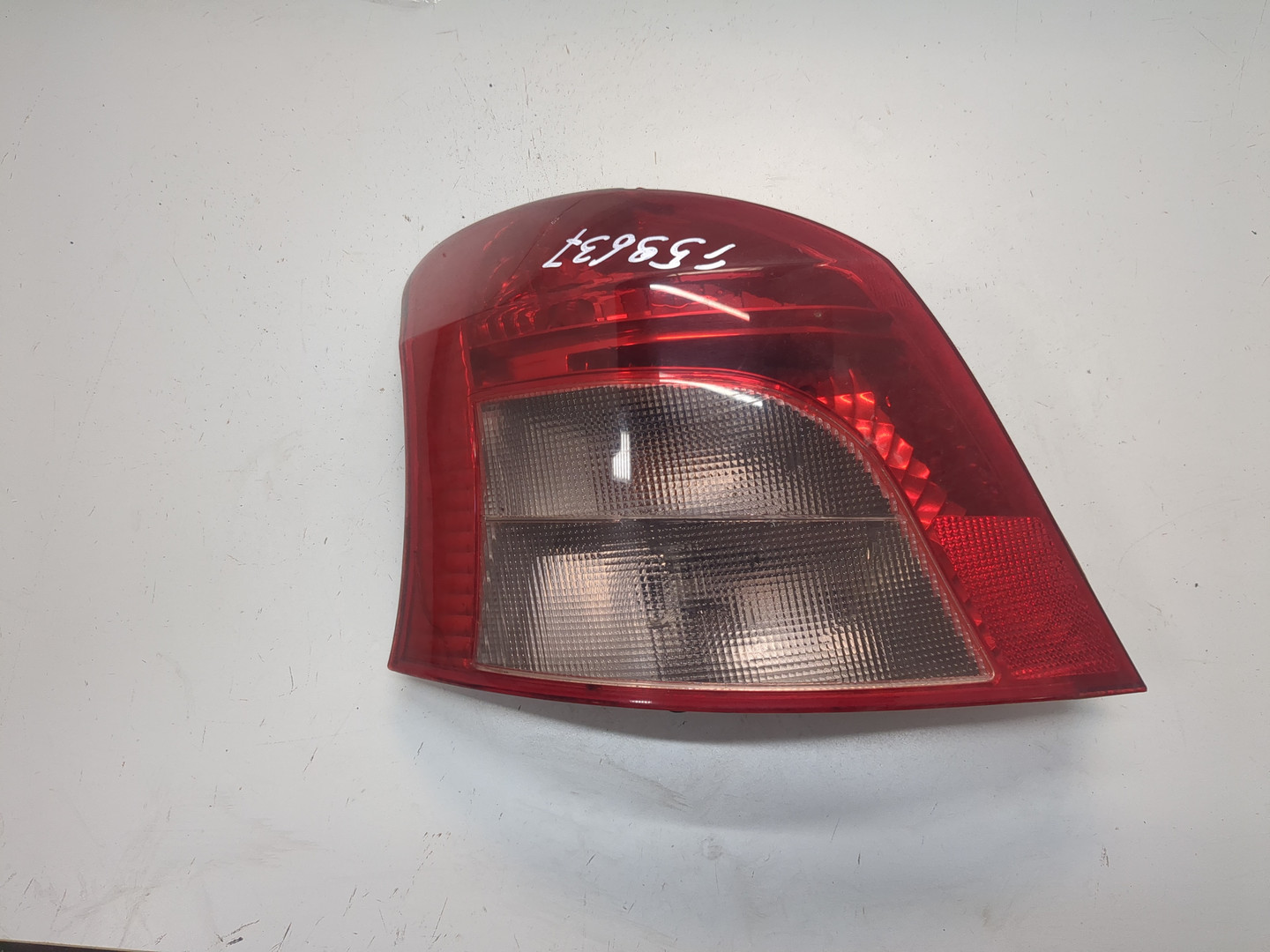 Фонарь задний левый