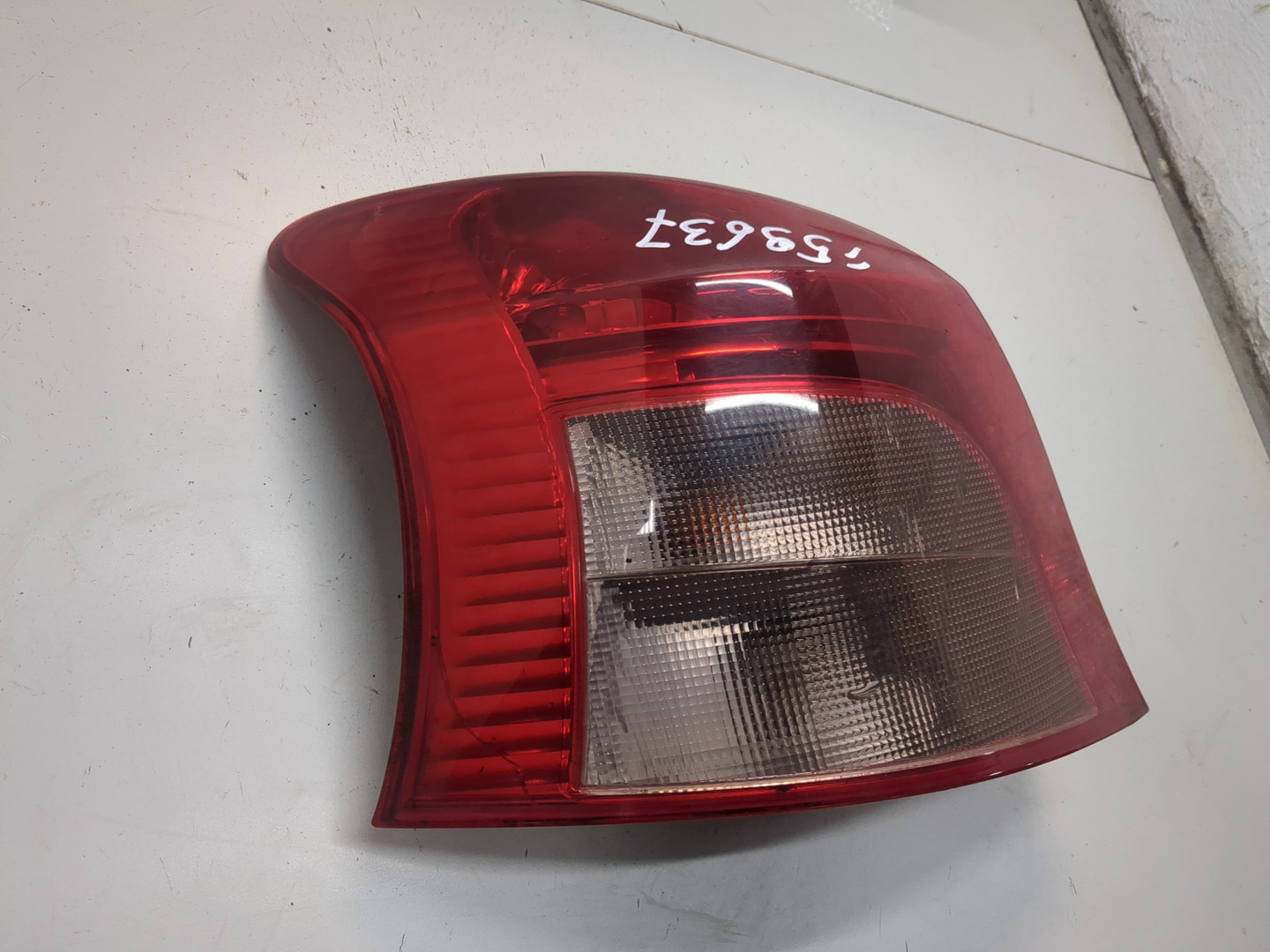 Фонарь задний левый