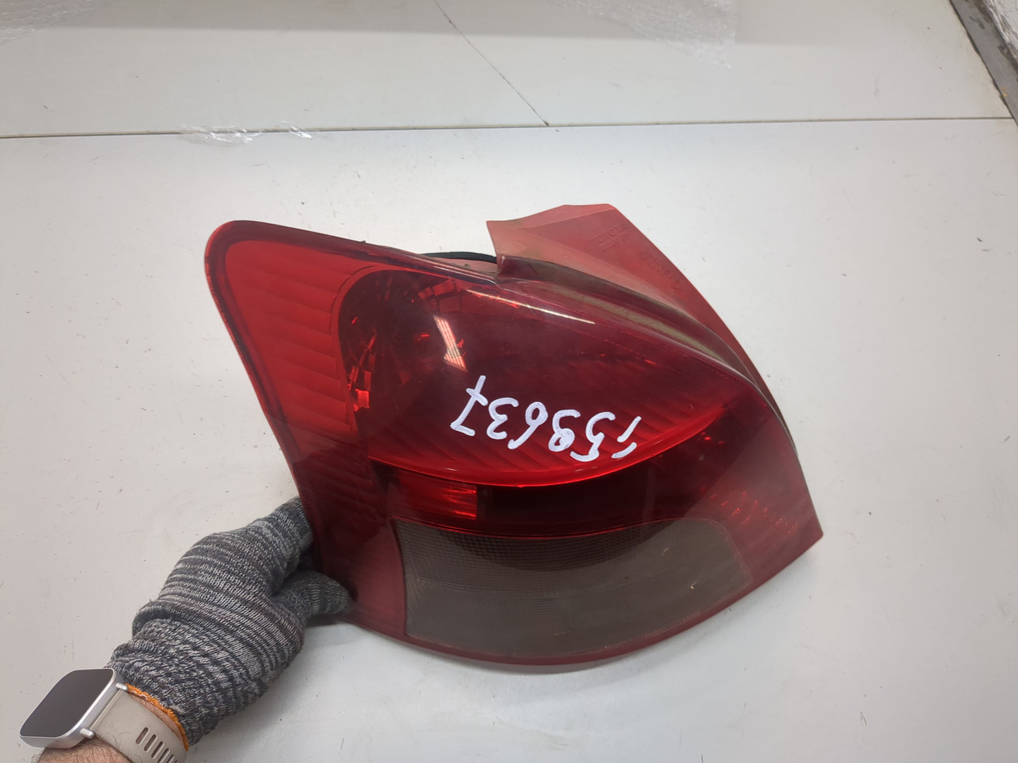 Фонарь задний левый