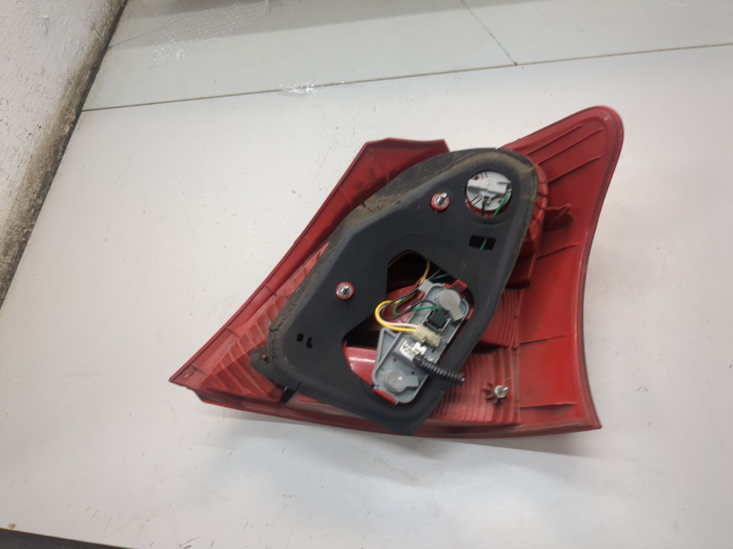 Фонарь задний левый