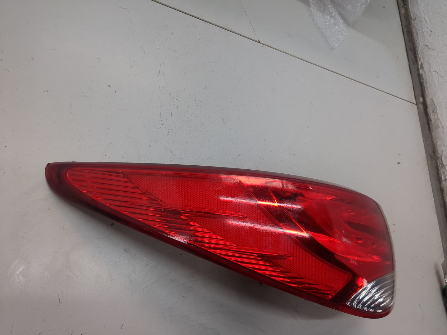 Фонарь задний левый