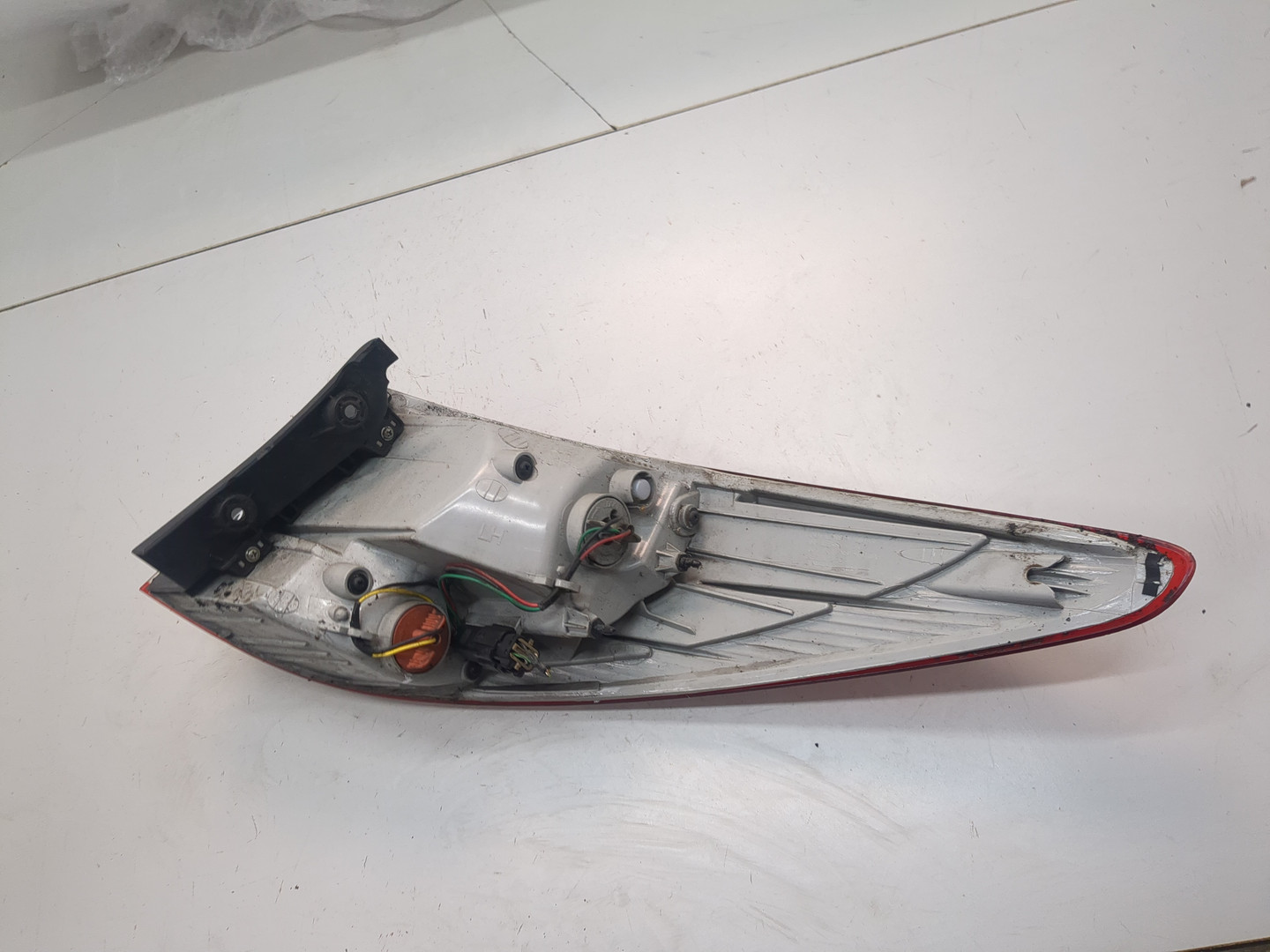 Фонарь задний левый