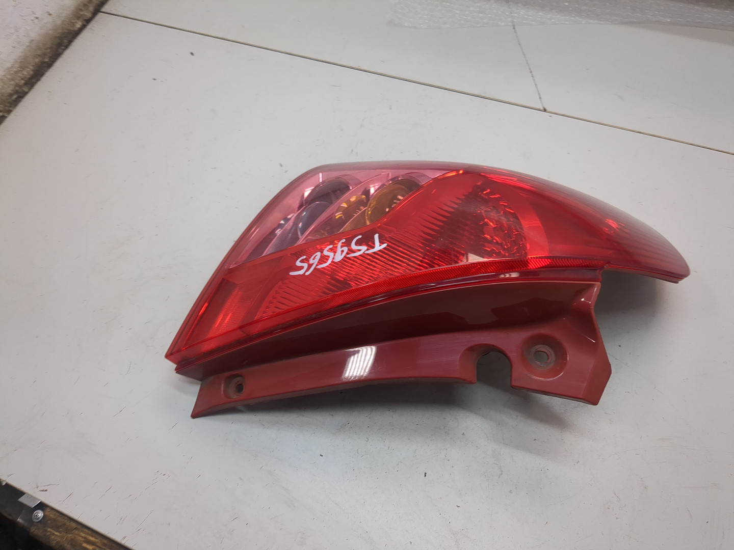 Фонарь задний левый