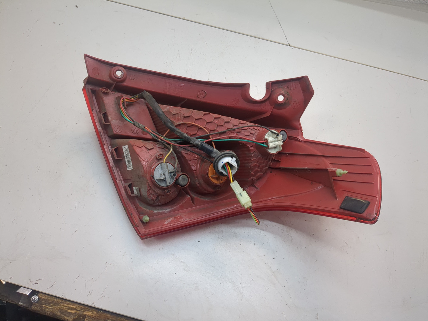 Фонарь задний левый