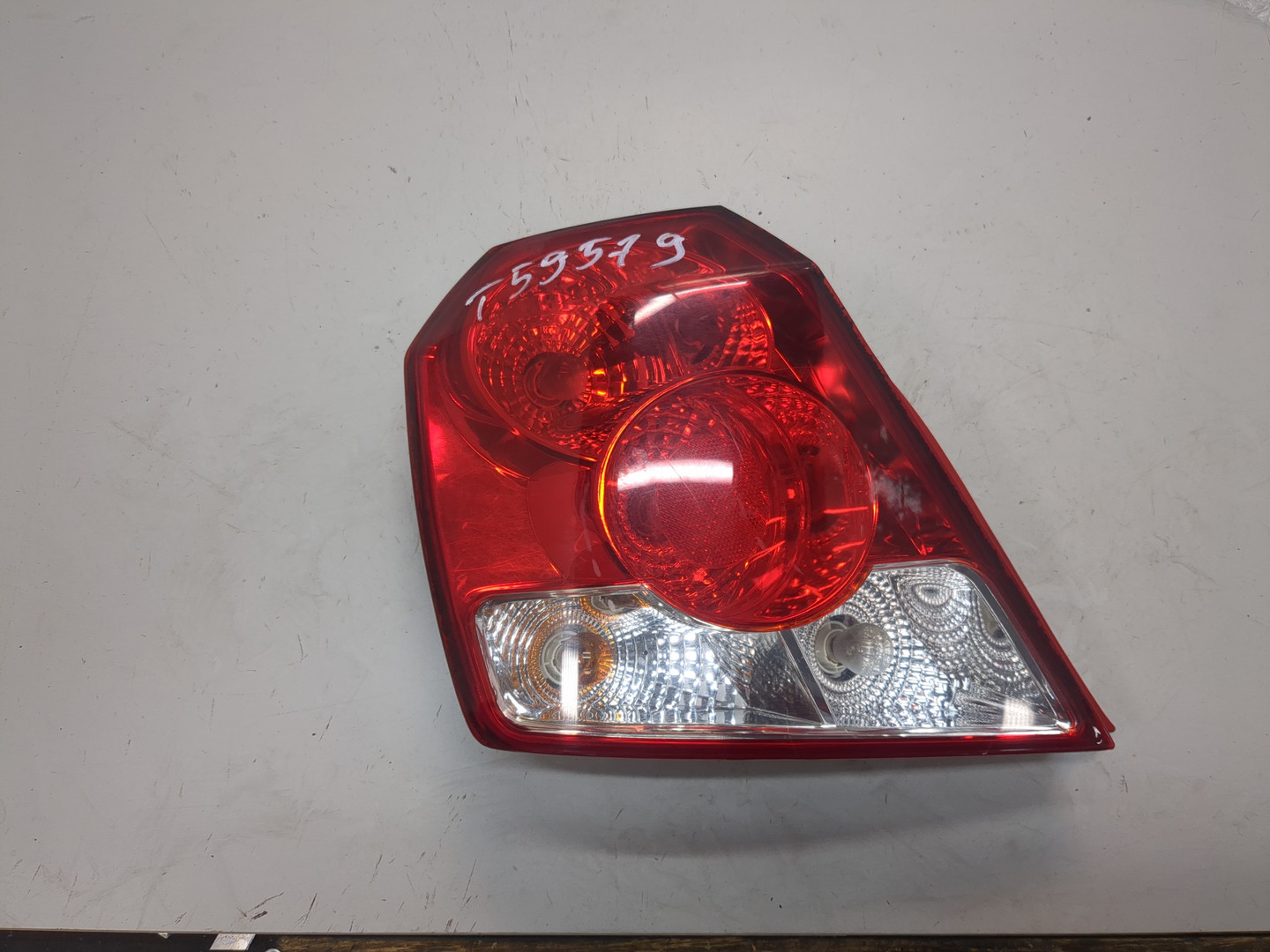 Фонарь задний левый