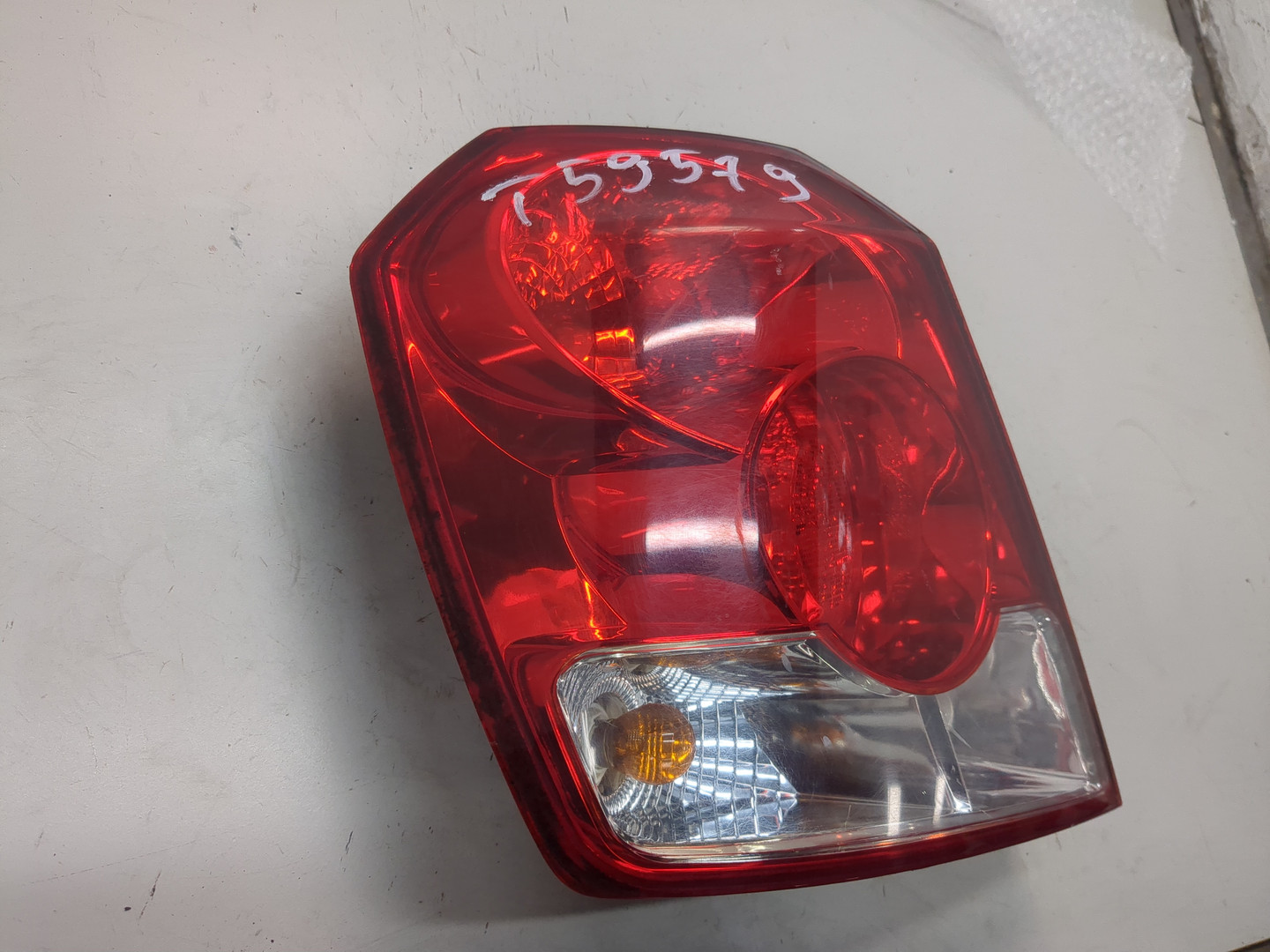 Фонарь задний левый