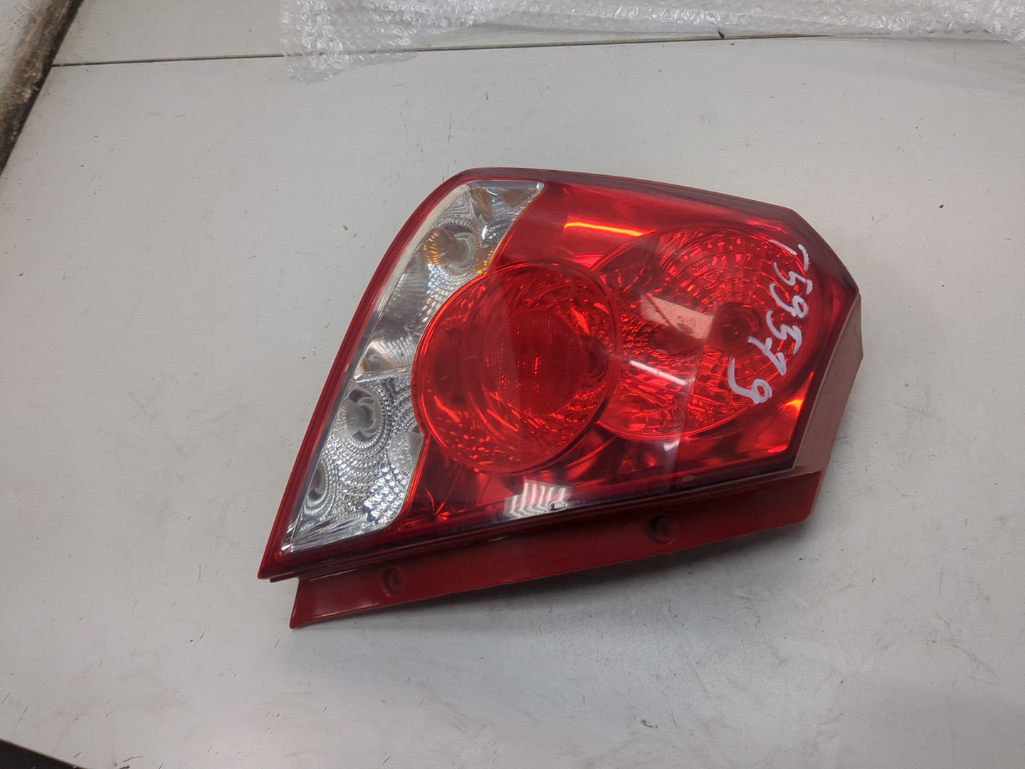 Фонарь задний левый