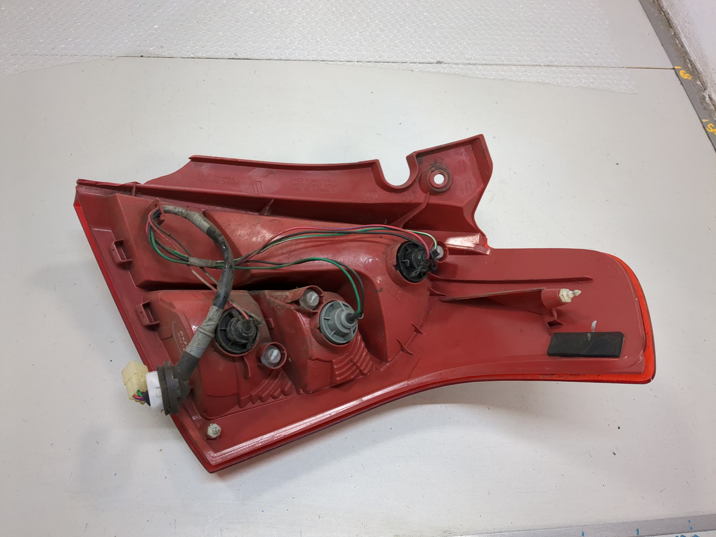 Фонарь задний левый