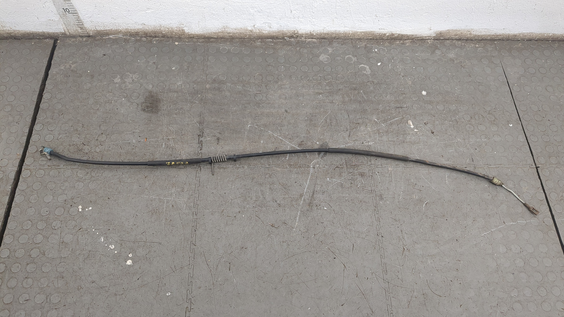 Трос стояночного тормоза