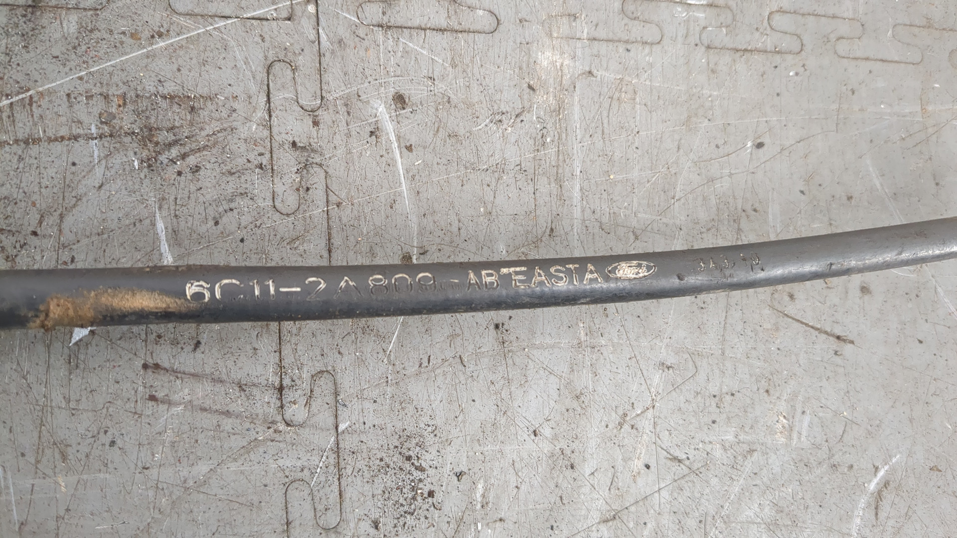 Трос стояночного тормоза