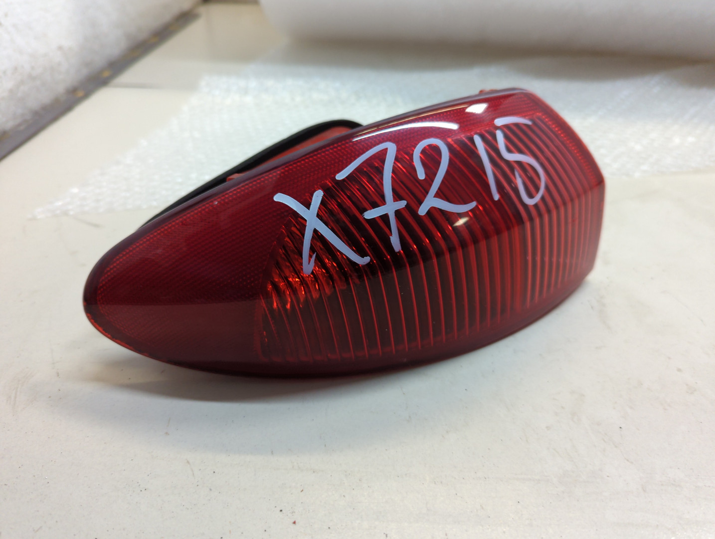 Фонарь задний левый