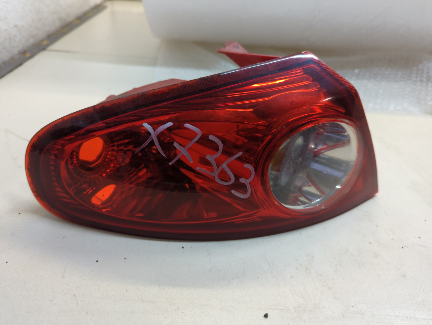 Фонарь задний левый