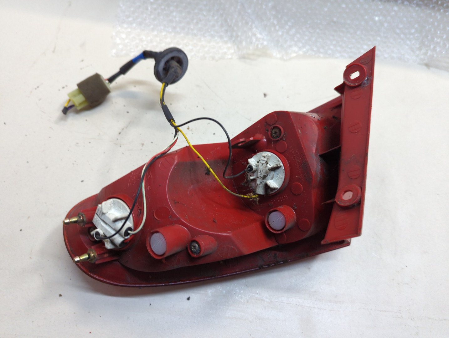 Фонарь задний левый