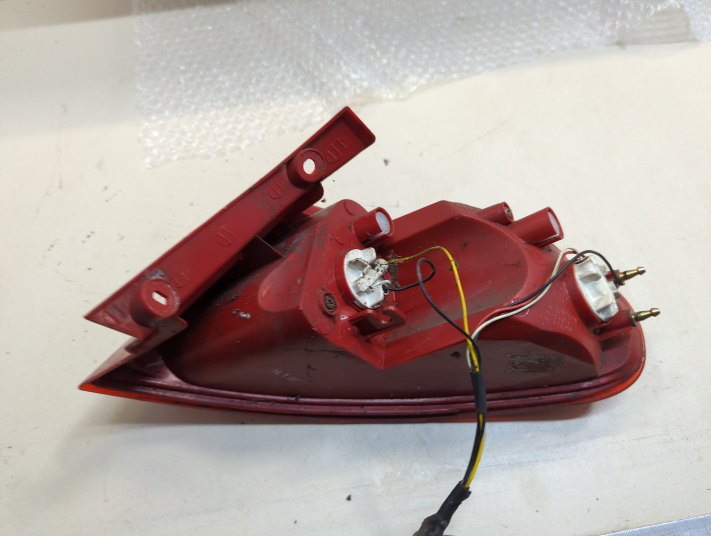 Фонарь задний левый