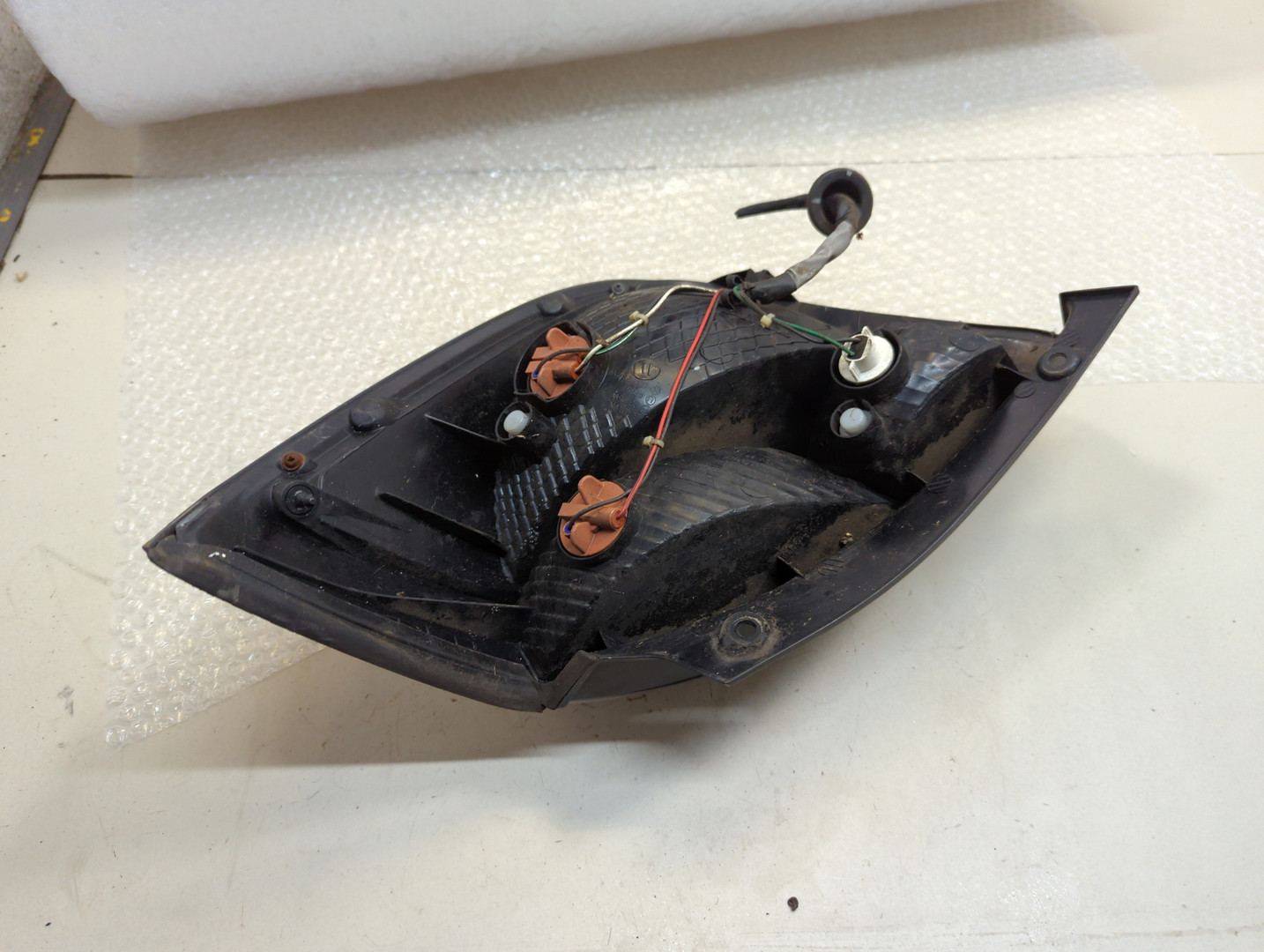 Фонарь задний левый