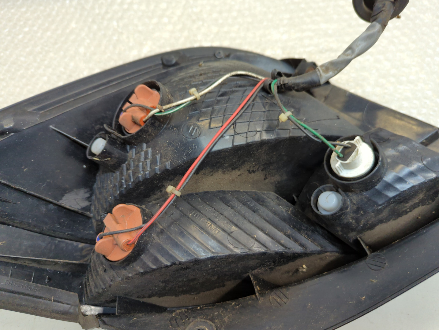 Фонарь задний левый