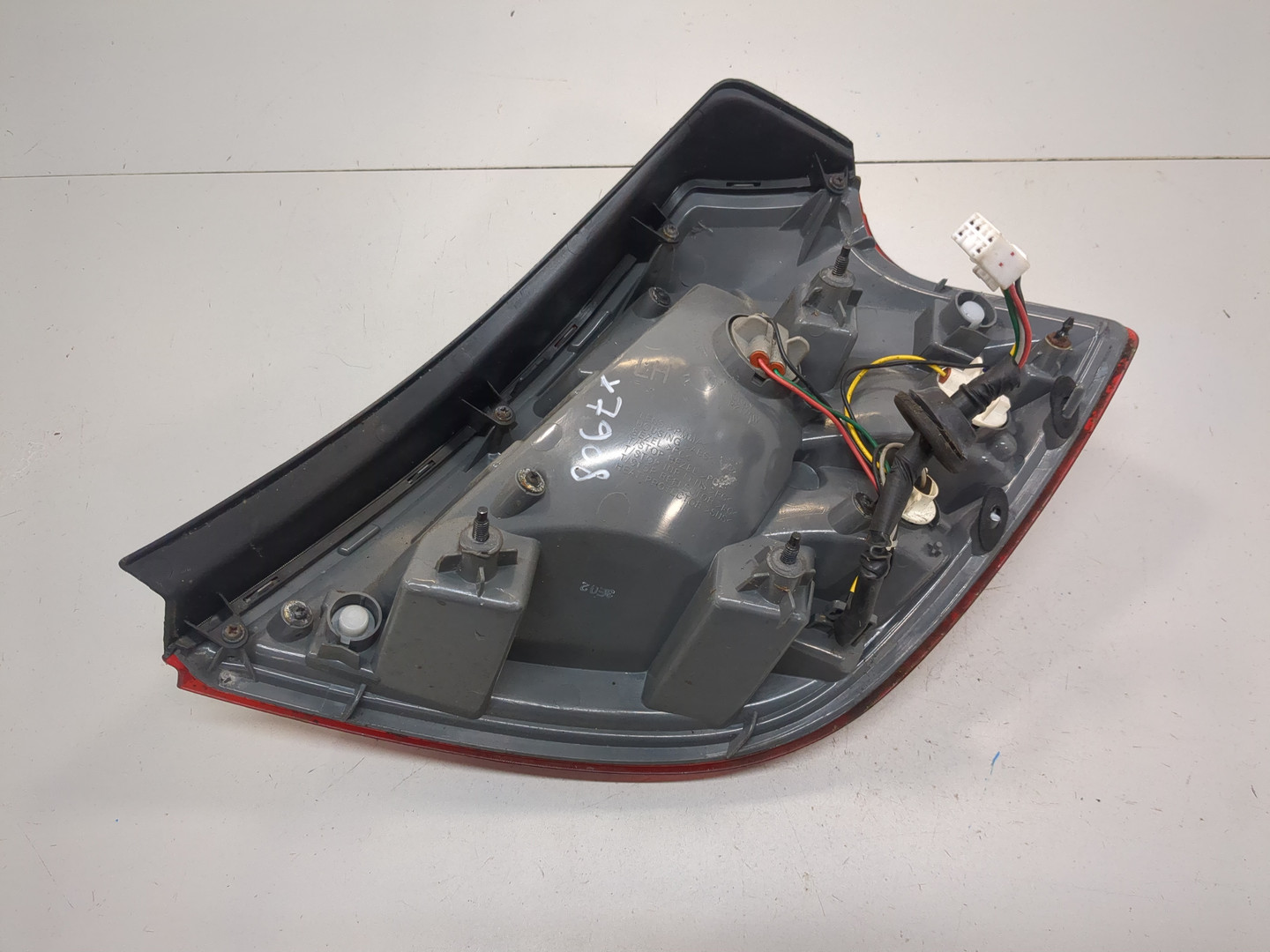 Фонарь задний левый