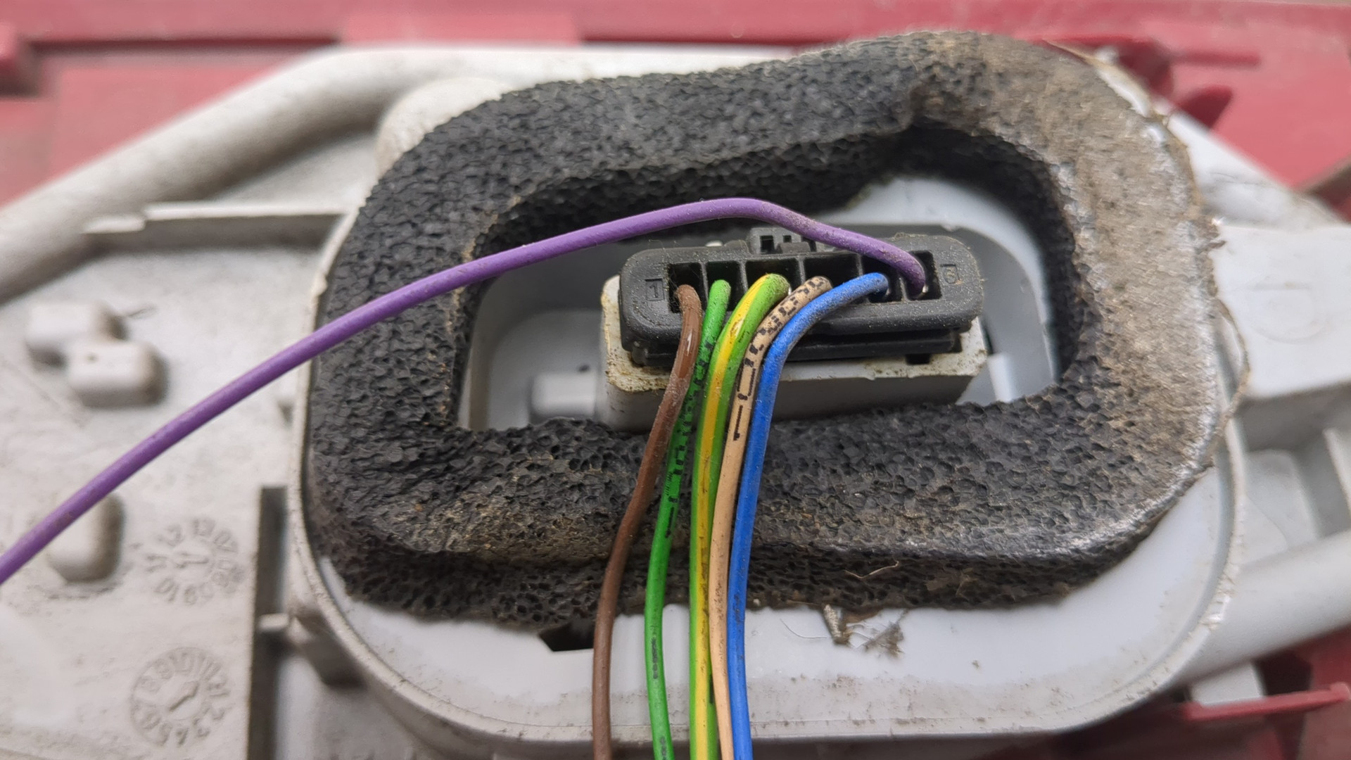 Фонарь задний левый