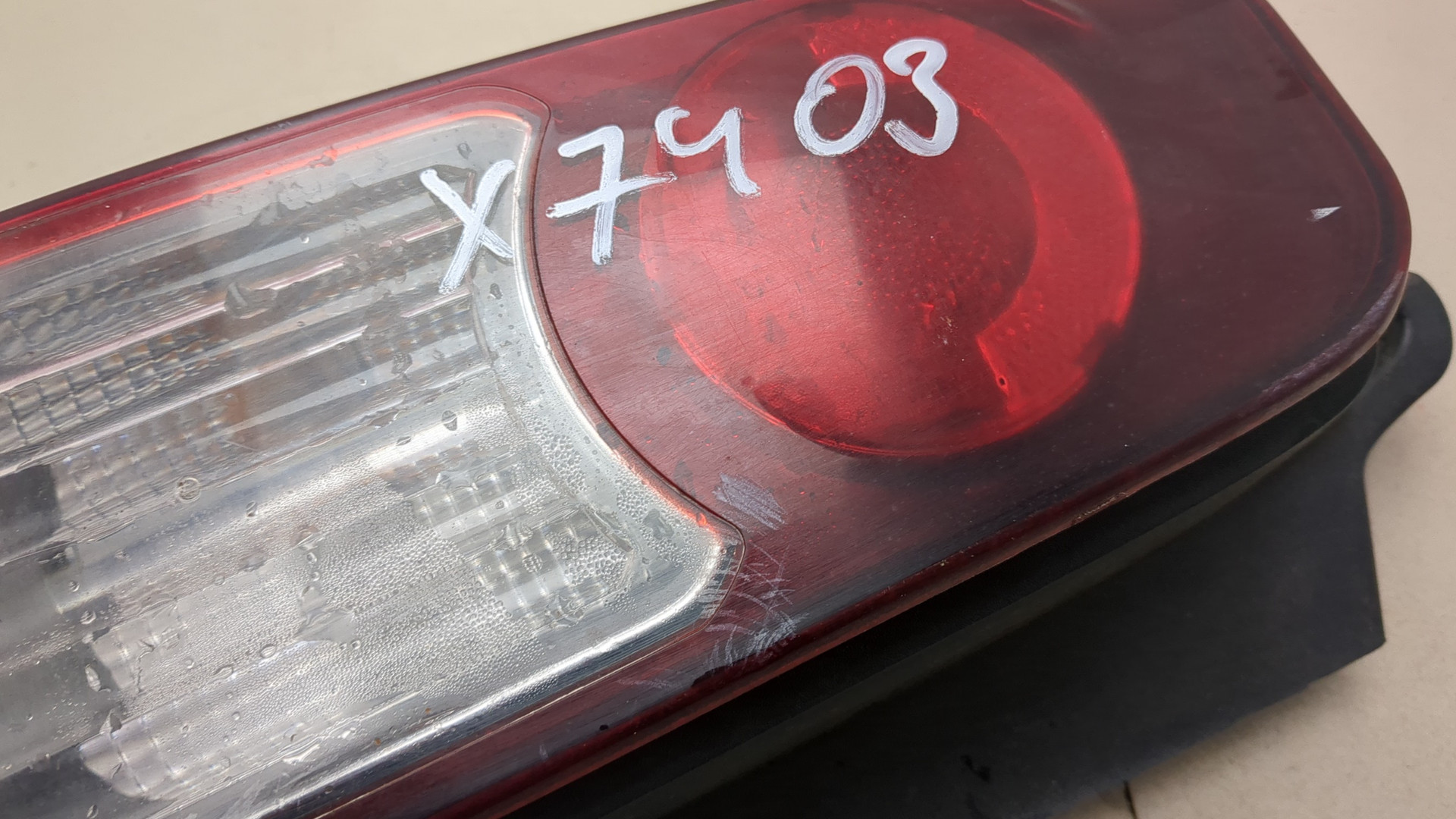 Фонарь задний левый