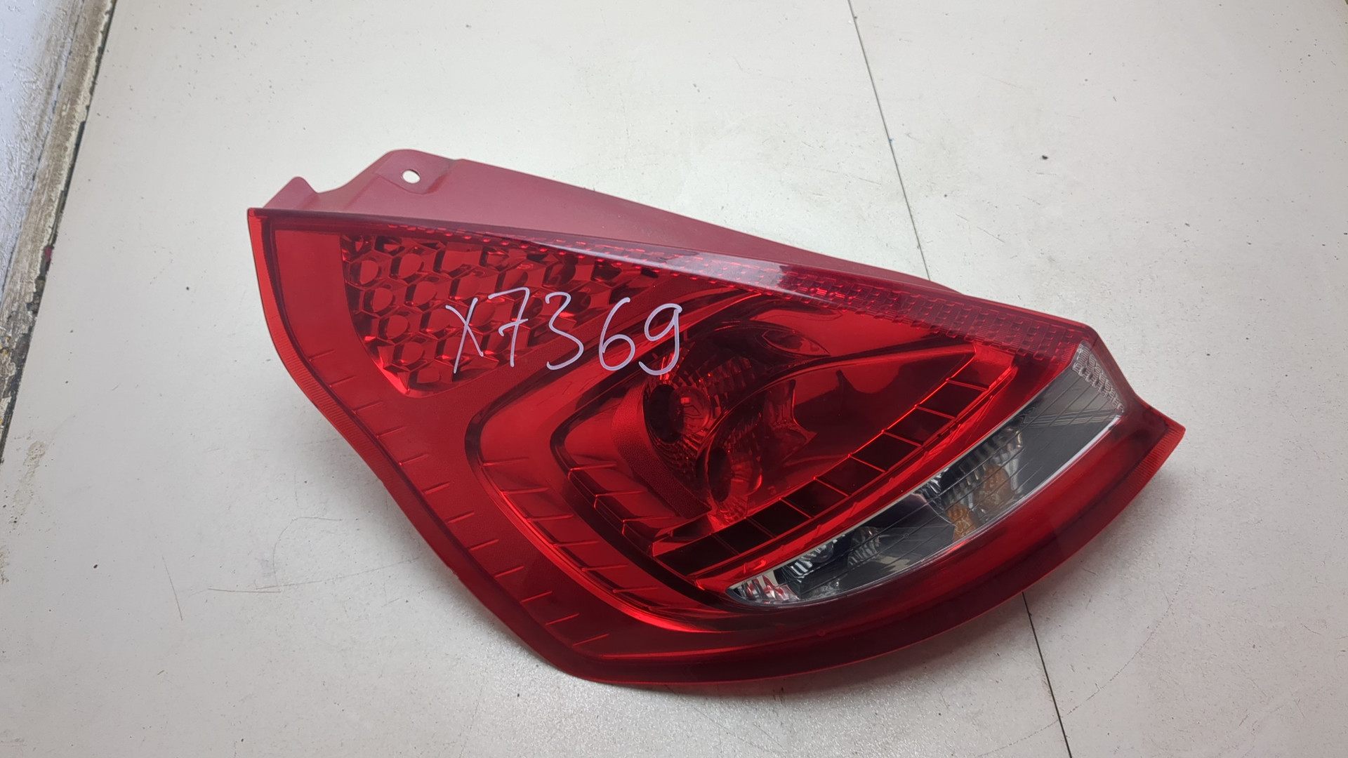 Фонарь задний левый