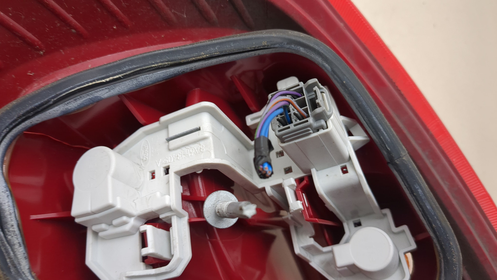 Фонарь задний левый