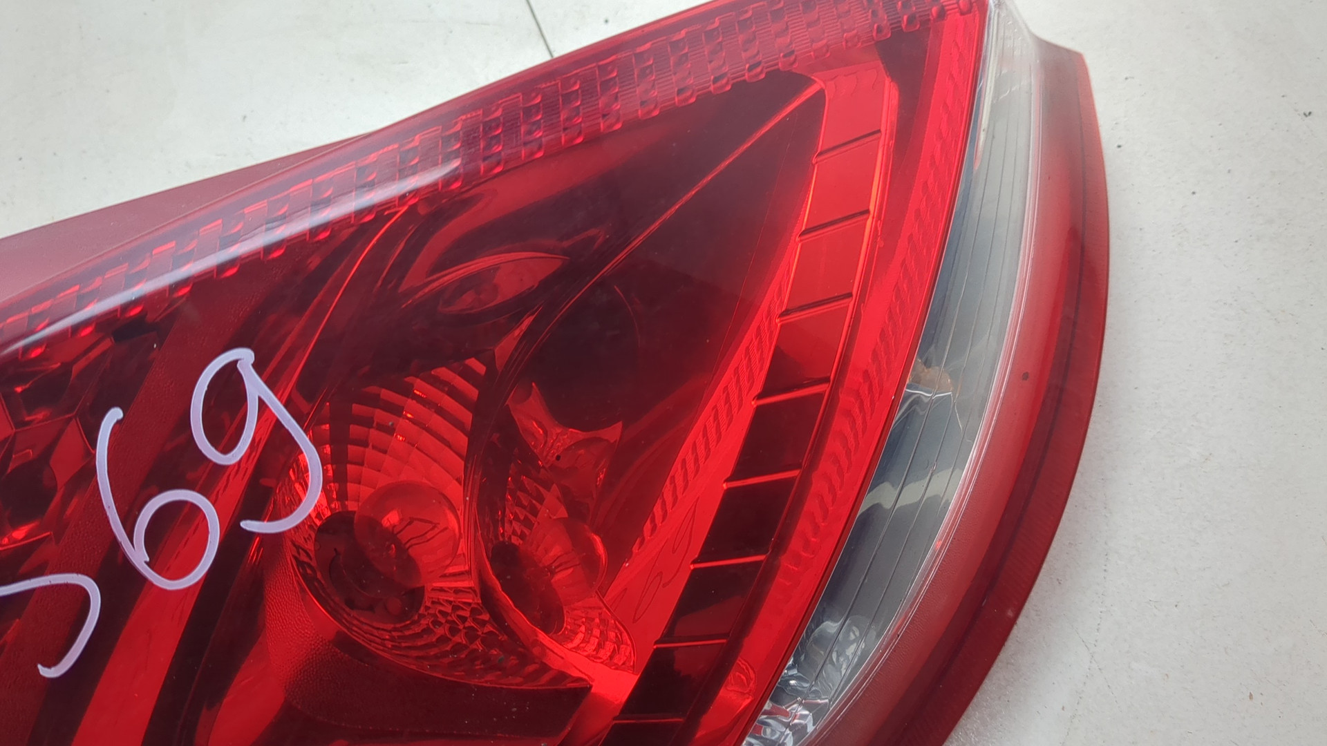 Фонарь задний левый