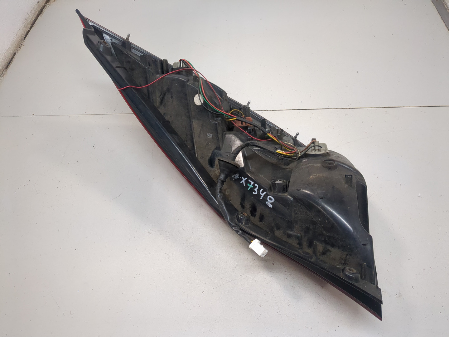 Фонарь задний левый