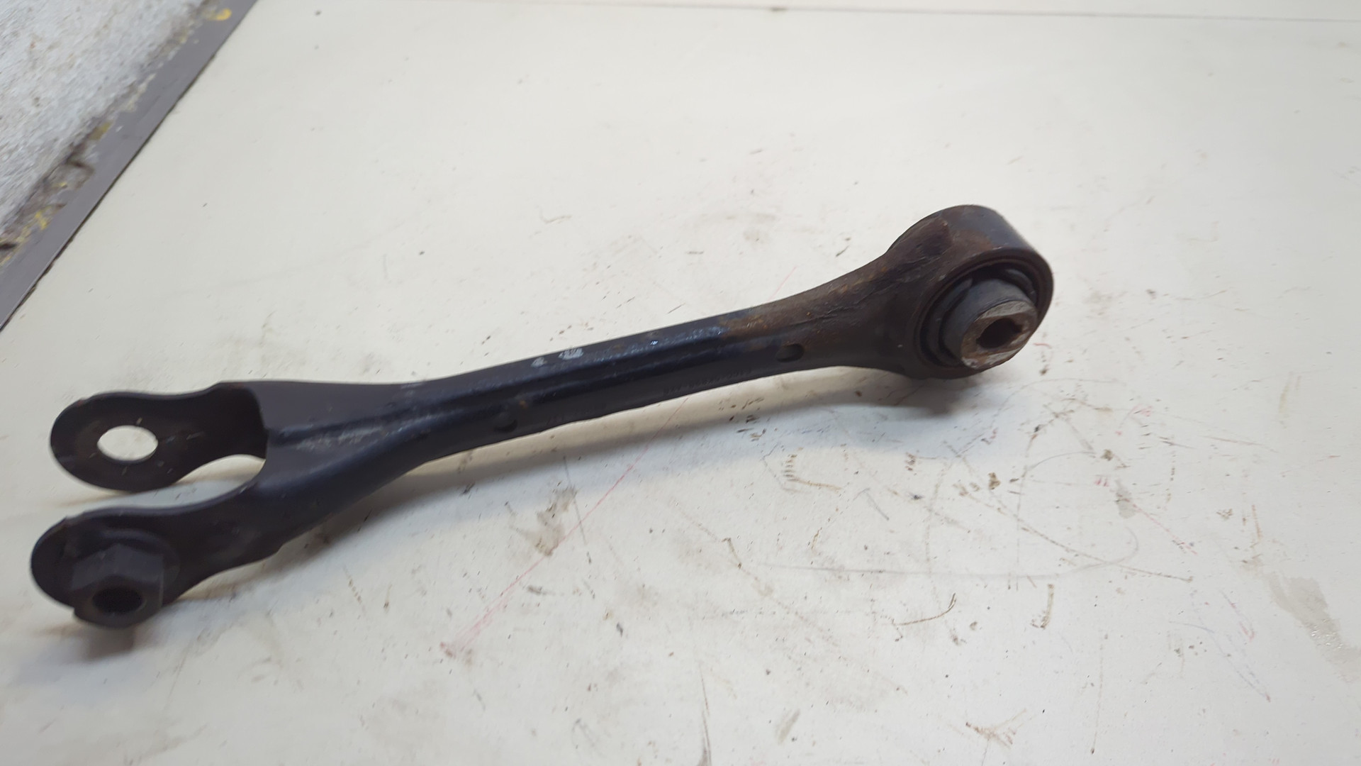 Рычаг задний