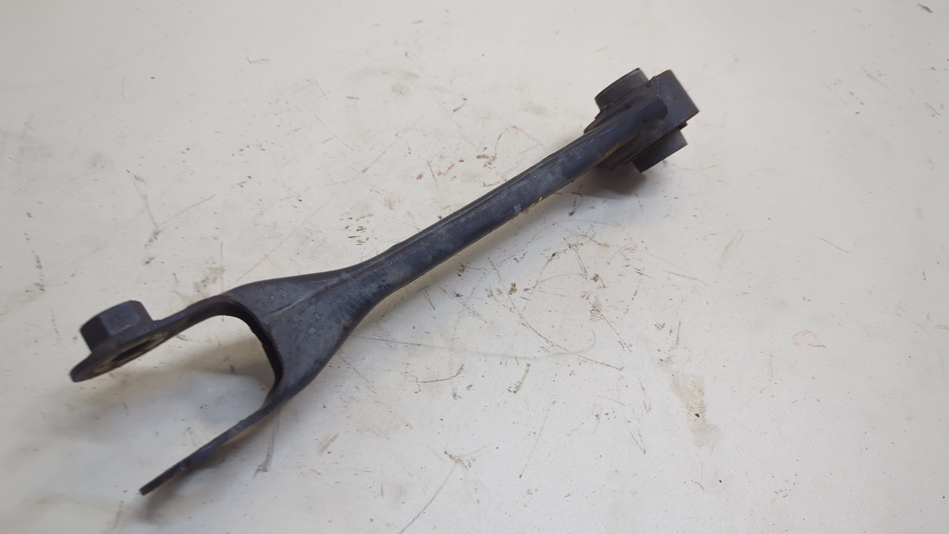 Рычаг задний