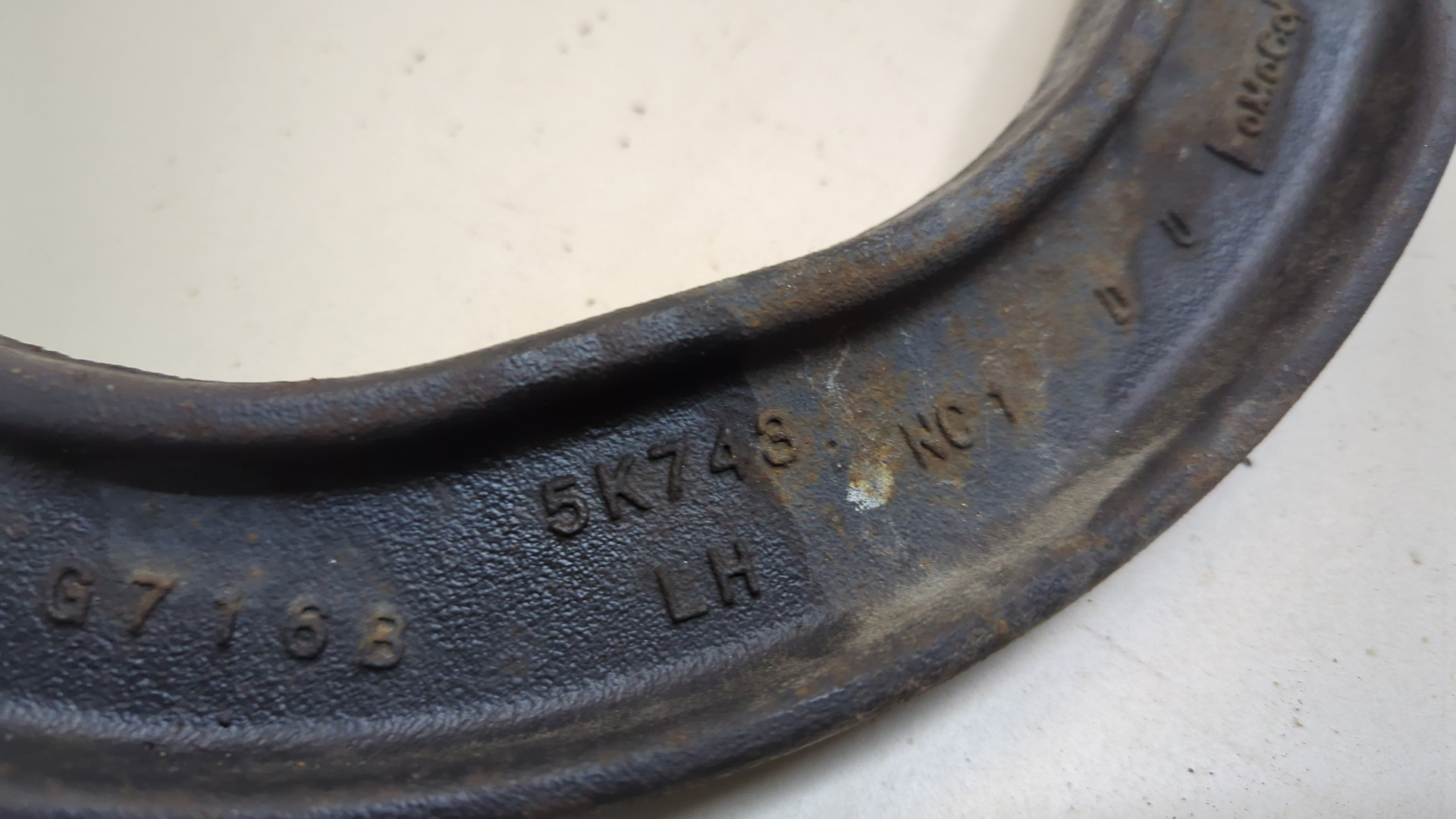 Рычаг задний левый