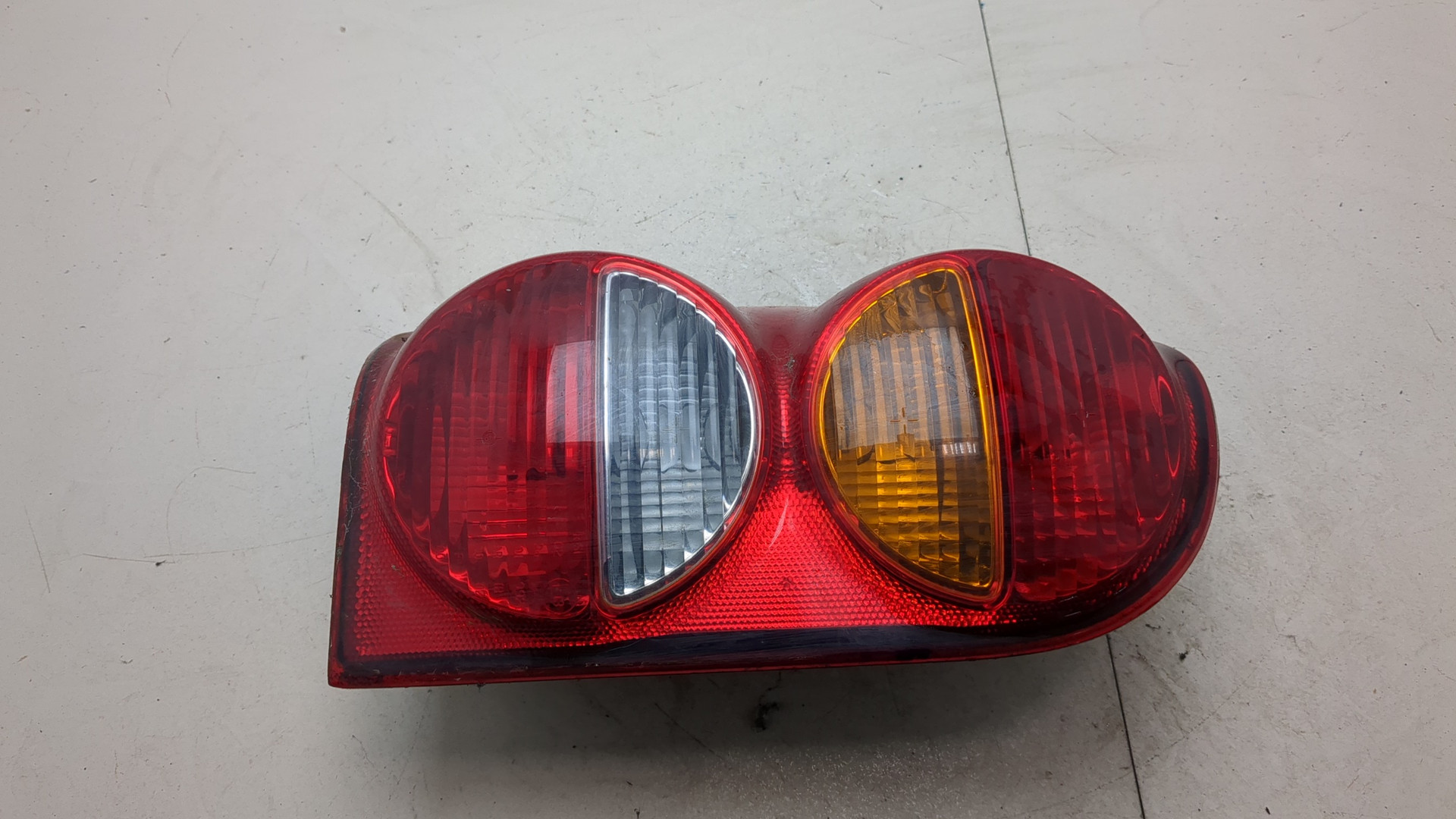 Фонарь задний левый