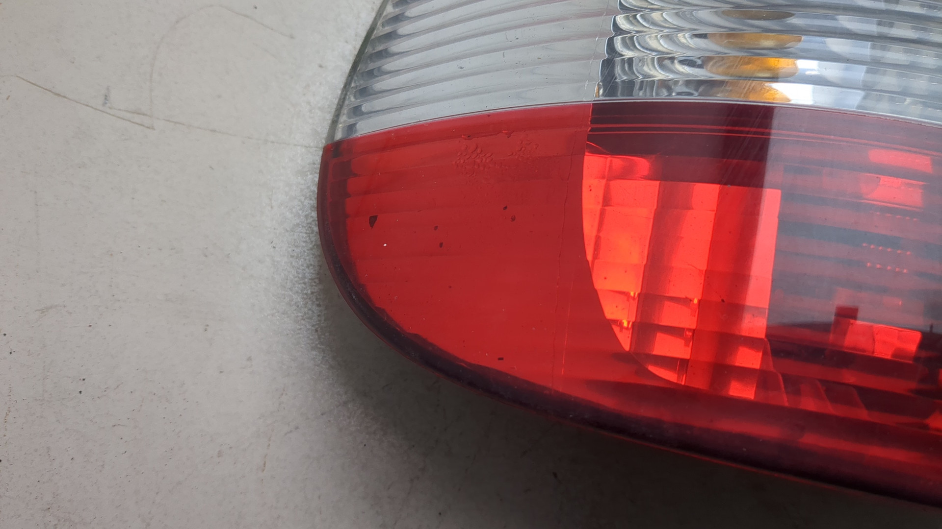 Фонарь задний левый