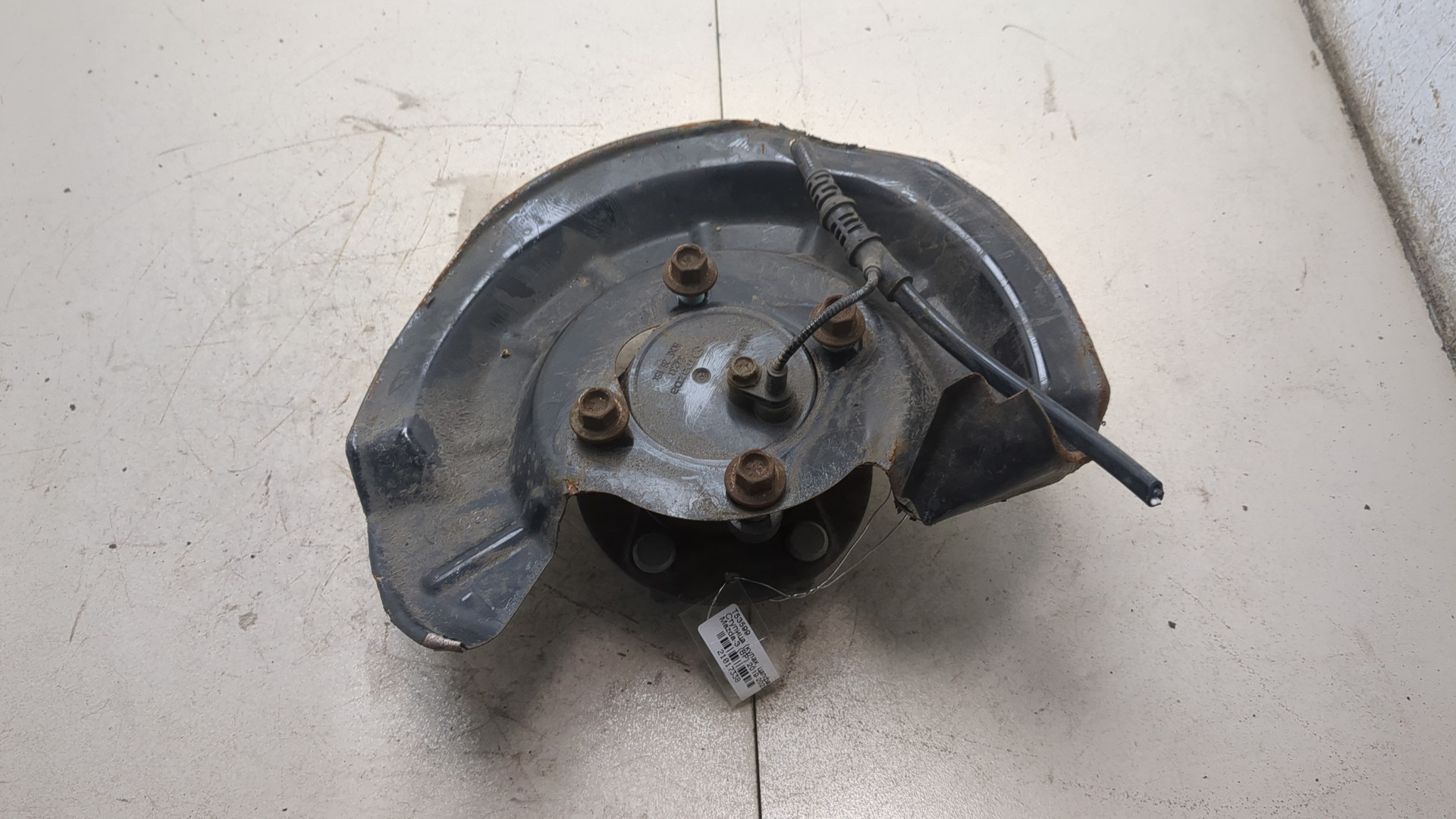 Кулак поворотный задний левый