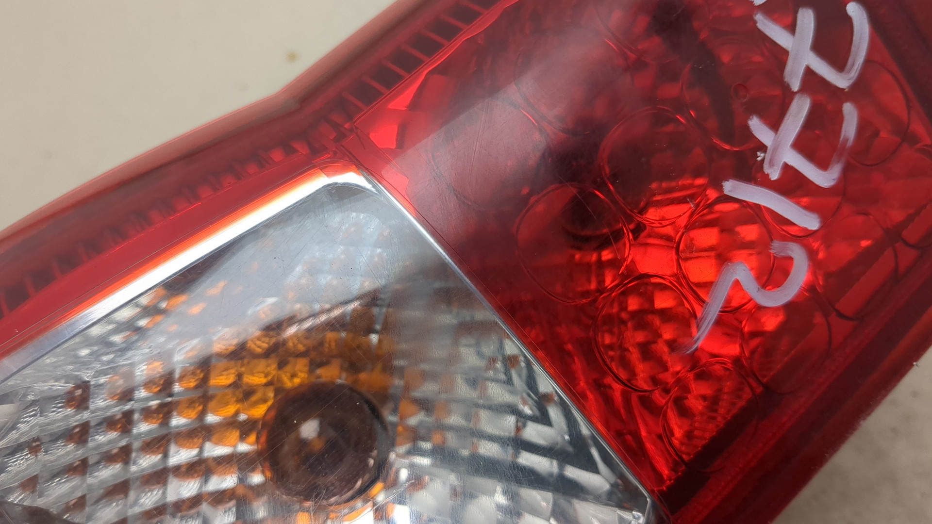 Фонарь задний левый