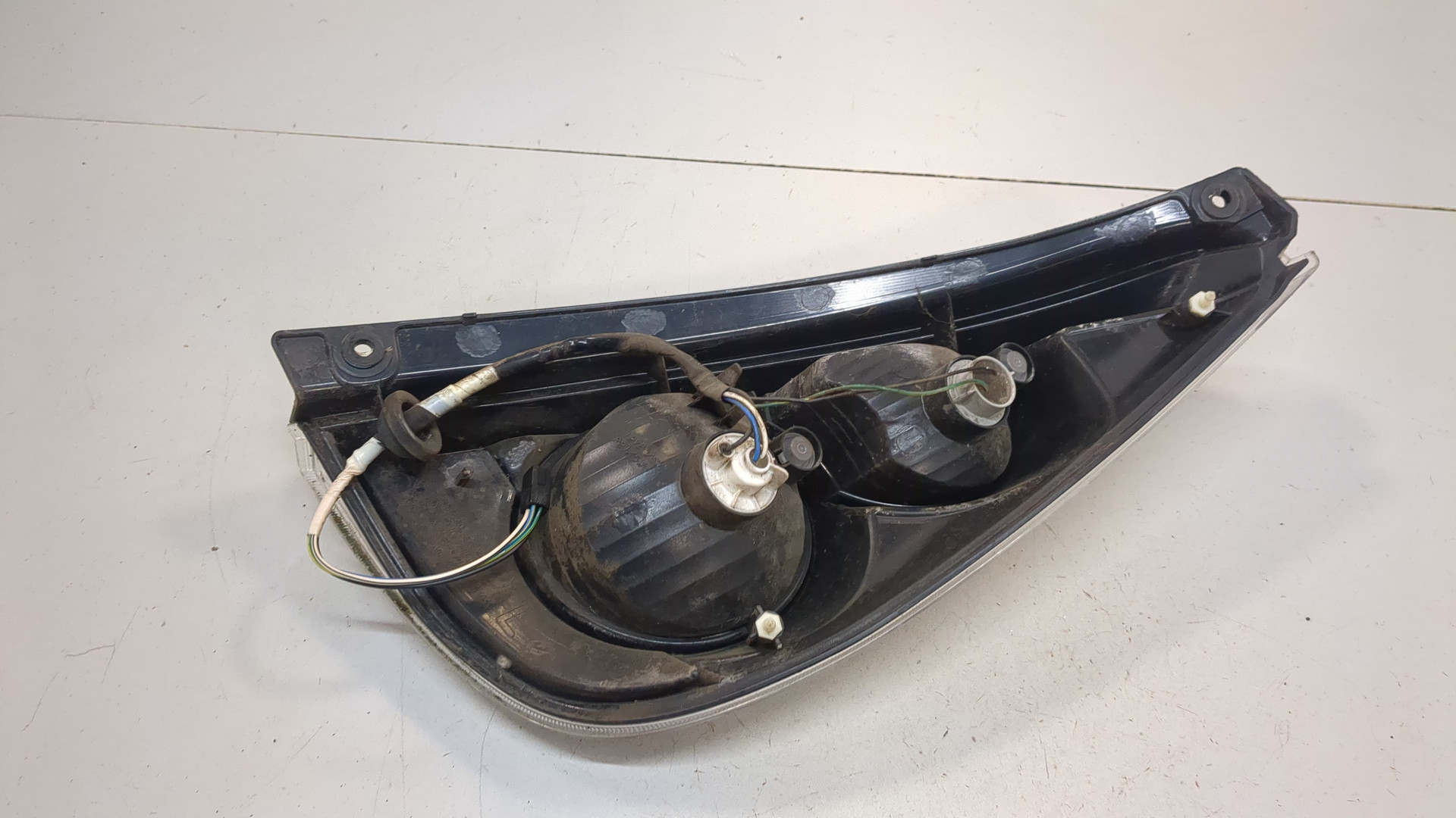 Фонарь задний левый