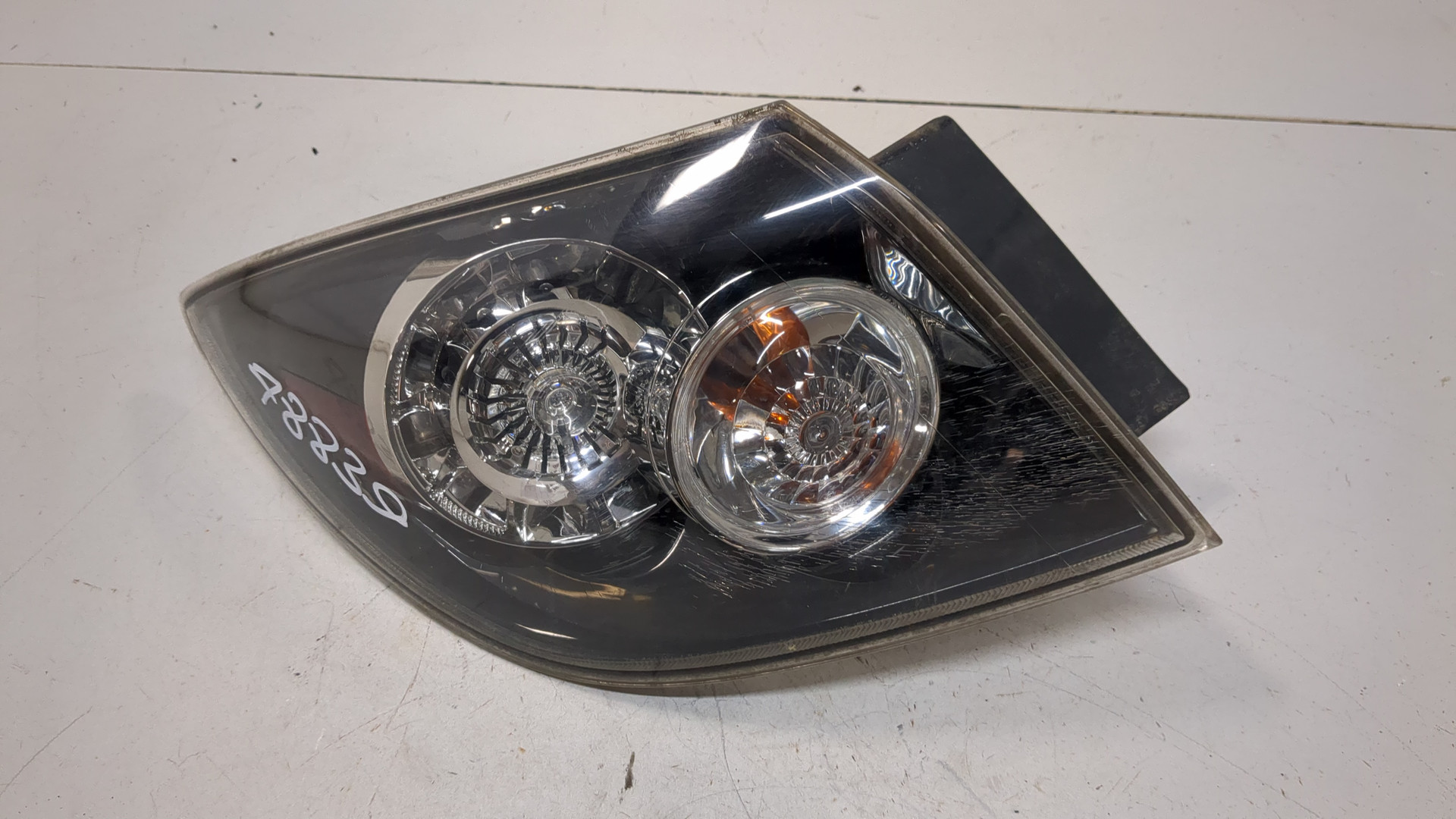 Фонарь задний левый