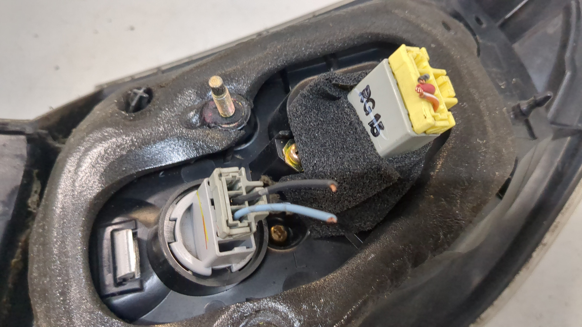 Фонарь задний левый